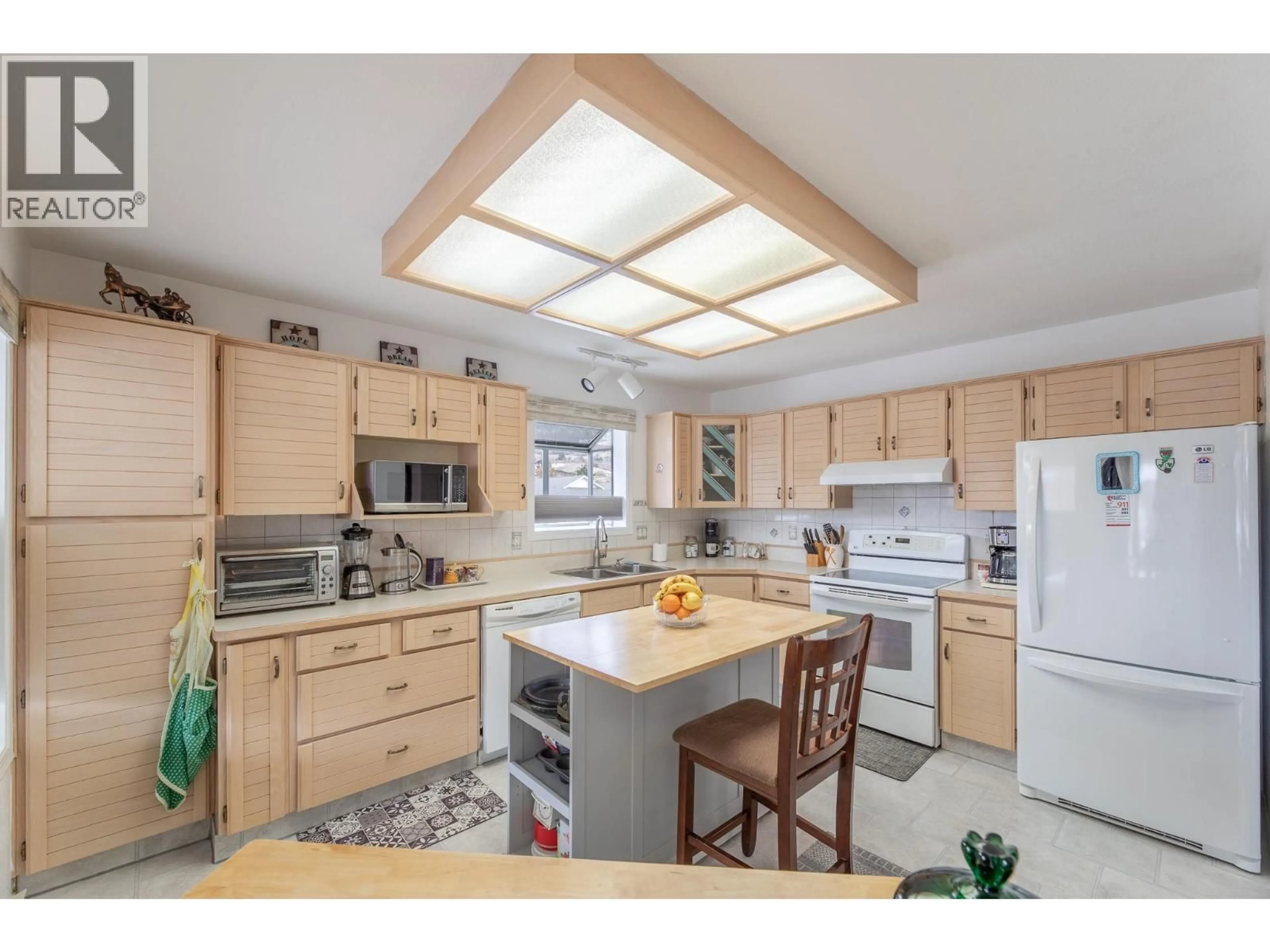 Open concept kitchen, unknown for 202 - 62 DAUPHIN AVENUE, Penticton British Columbia V2A6V8