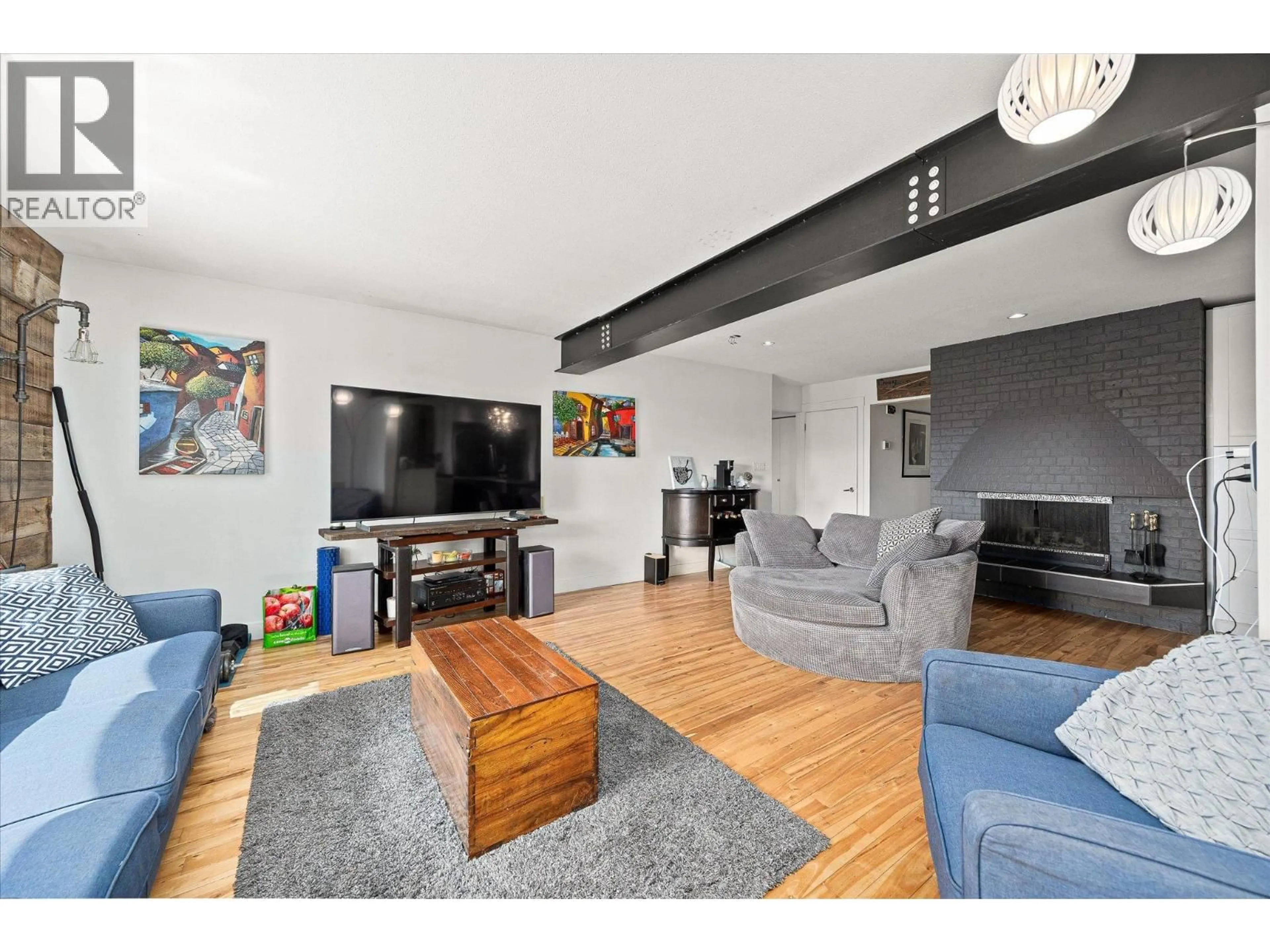 Living room with furniture, unknown for 15 BELLO ROAD, Kelowna British Columbia V1V1B9