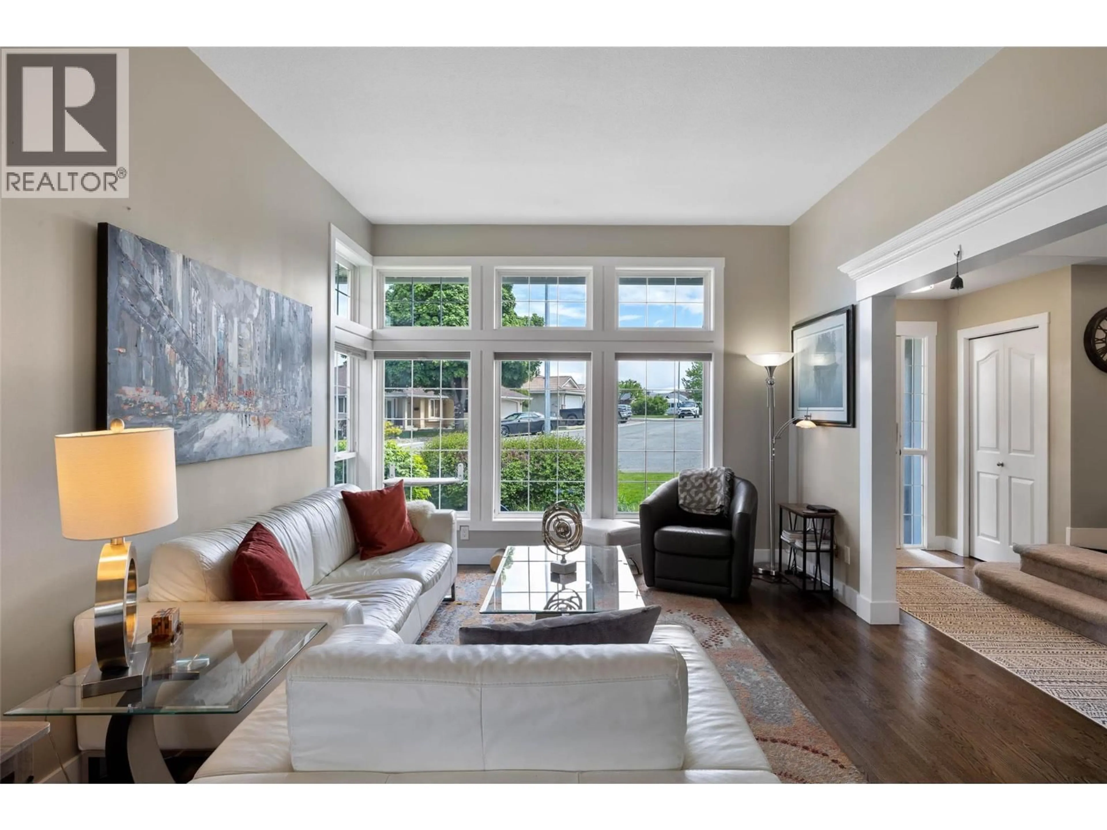 Living room with furniture, wood/laminate floor for 2010 MUIRFIELD ROAD, Kamloops British Columbia V1S1S6