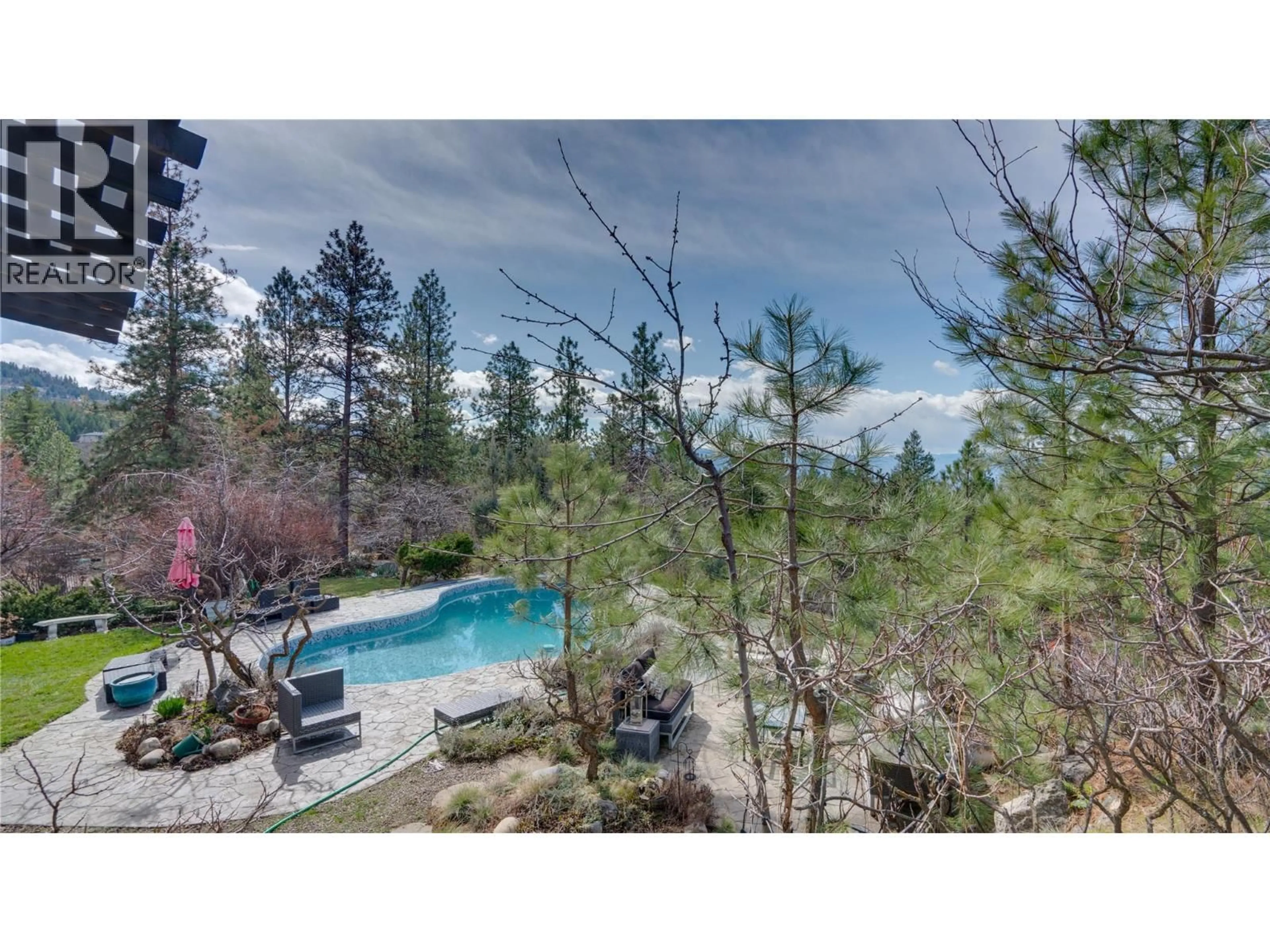 A pic from outside/outdoor area/front of a property/back of a property/a pic from drone, forest/trees view for 5775 DEADPINE DRIVE, Kelowna British Columbia V1P1A3