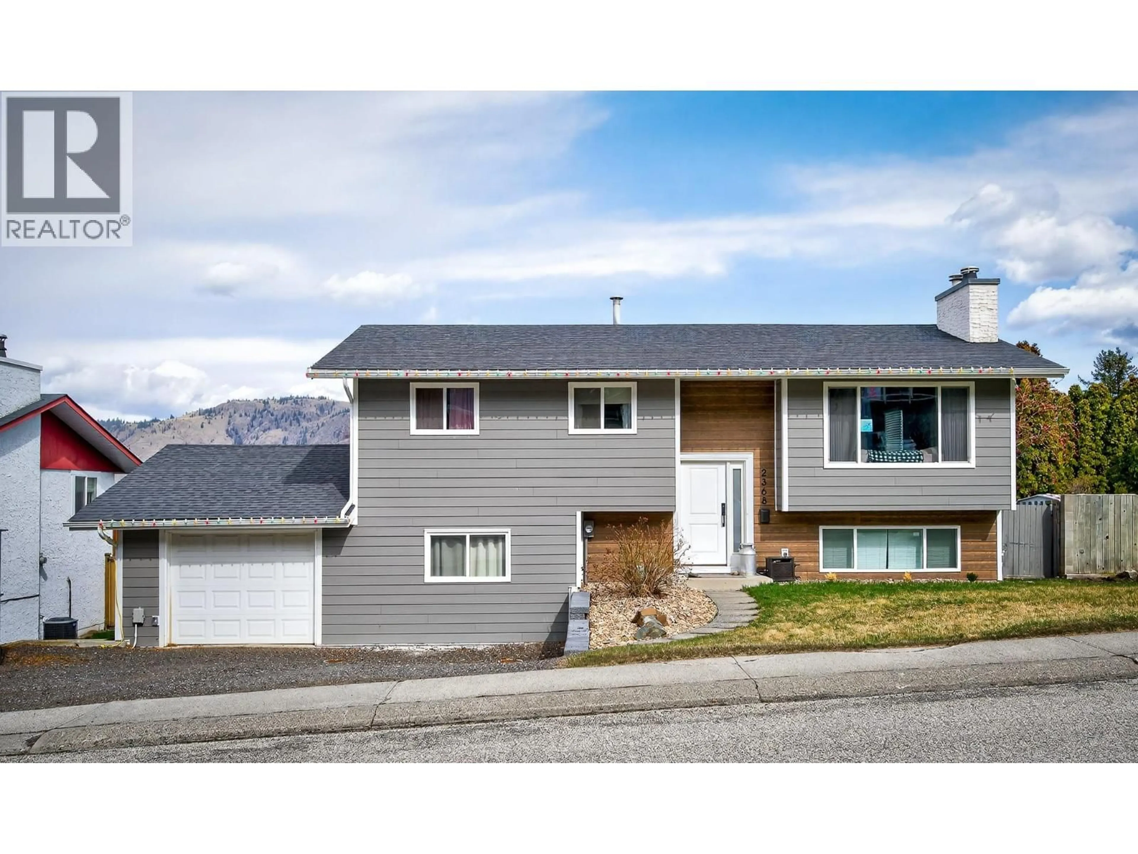Home with vinyl exterior material, street for 2368 OMINECA DRIVE, Kamloops British Columbia V2E1X3