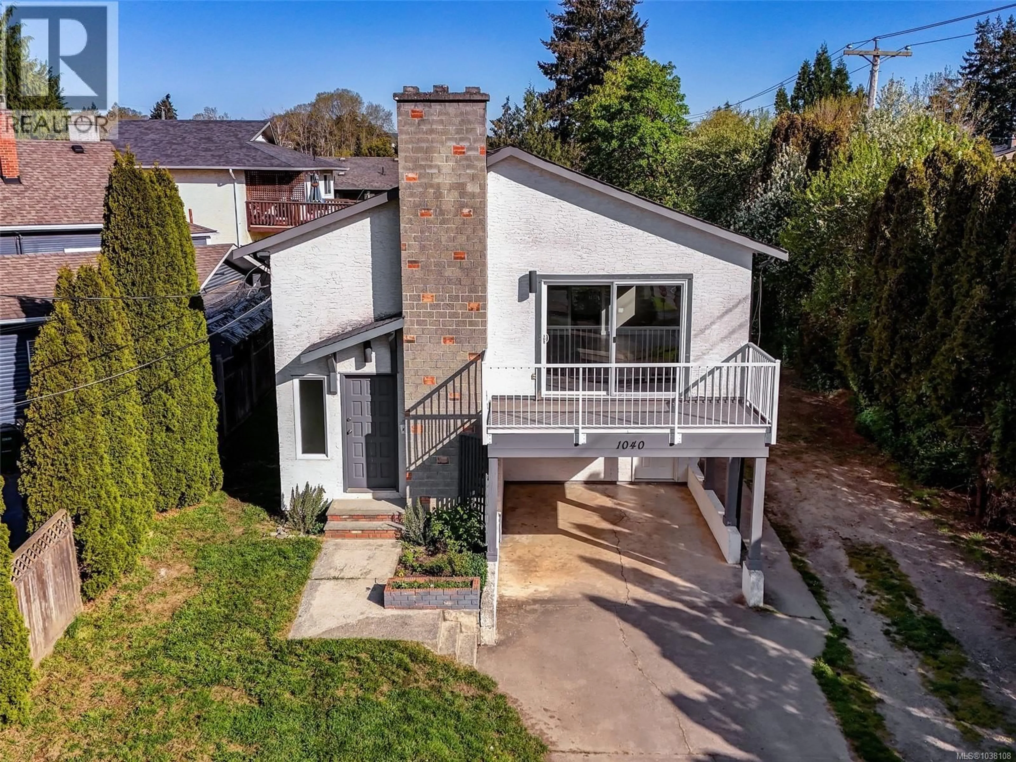 A pic from outside/outdoor area/front of a property/back of a property/a pic from drone, street for 1040 CHESTERFIELD ROAD, Saanich British Columbia V8Z2T8