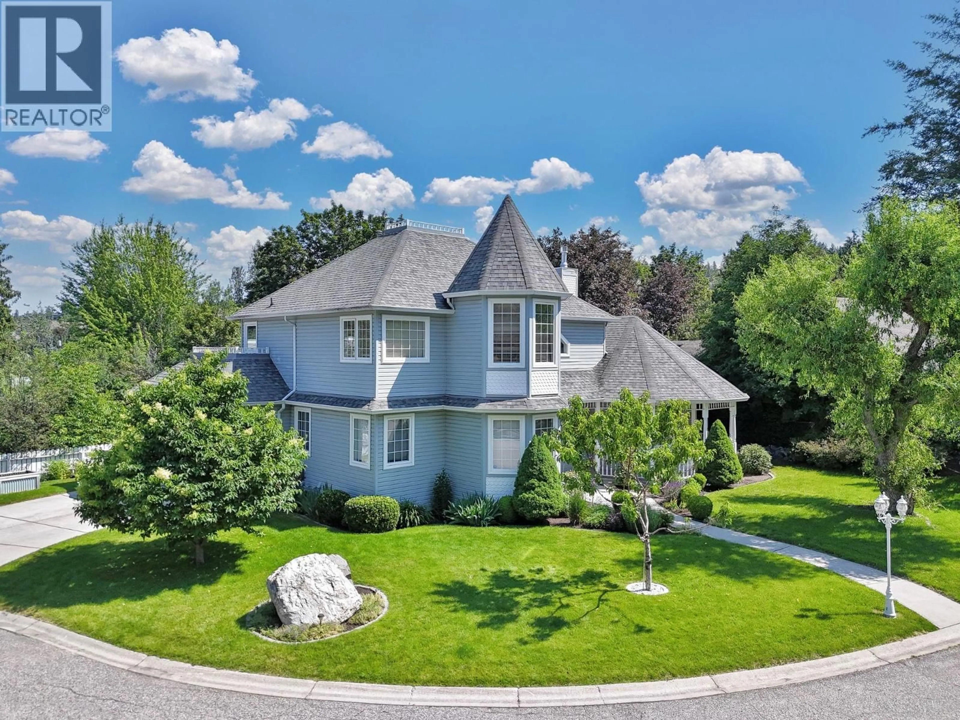 A pic from outside/outdoor area/front of a property/back of a property/a pic from drone, street for 758 VARNEY COURT, Kelowna British Columbia V1W3Z2