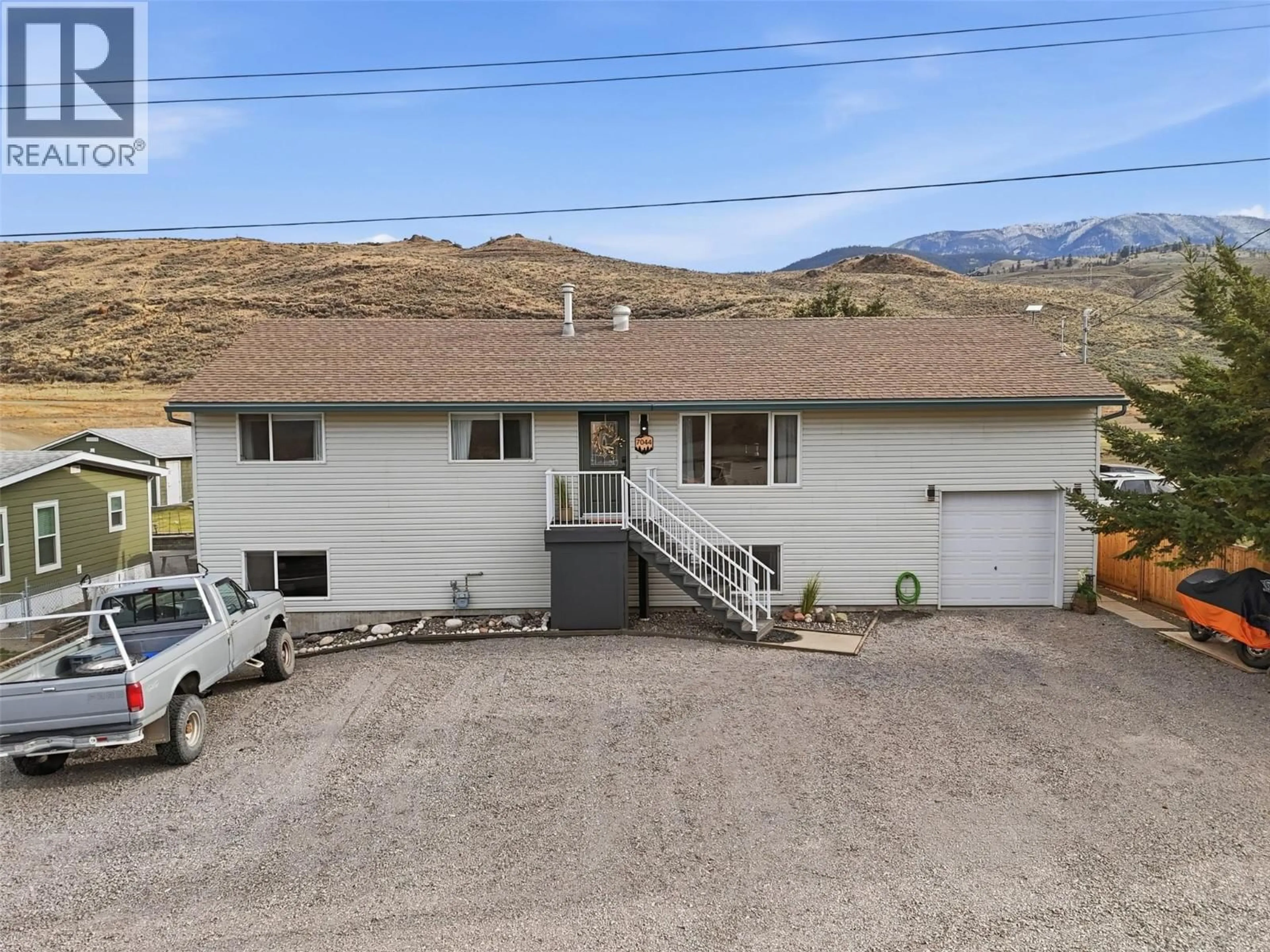 A pic from outside/outdoor area/front of a property/back of a property/a pic from drone, mountain view for 7044 WATSON DRIVE EAST, Kamloops British Columbia V0K2J0