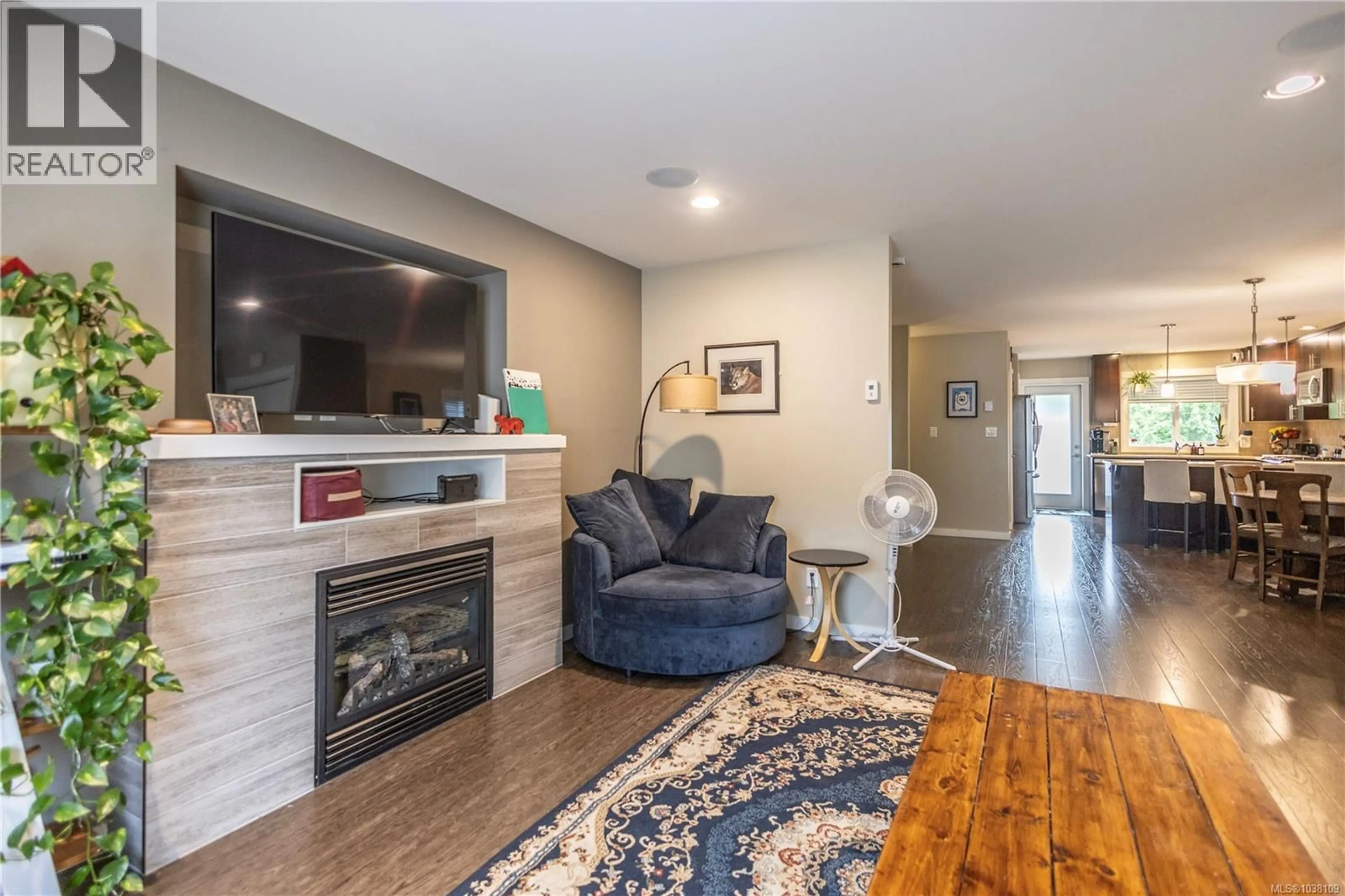 Living room with furniture, wood/laminate floor for 3377 RADIANT WAY, Langford British Columbia V9C0H5