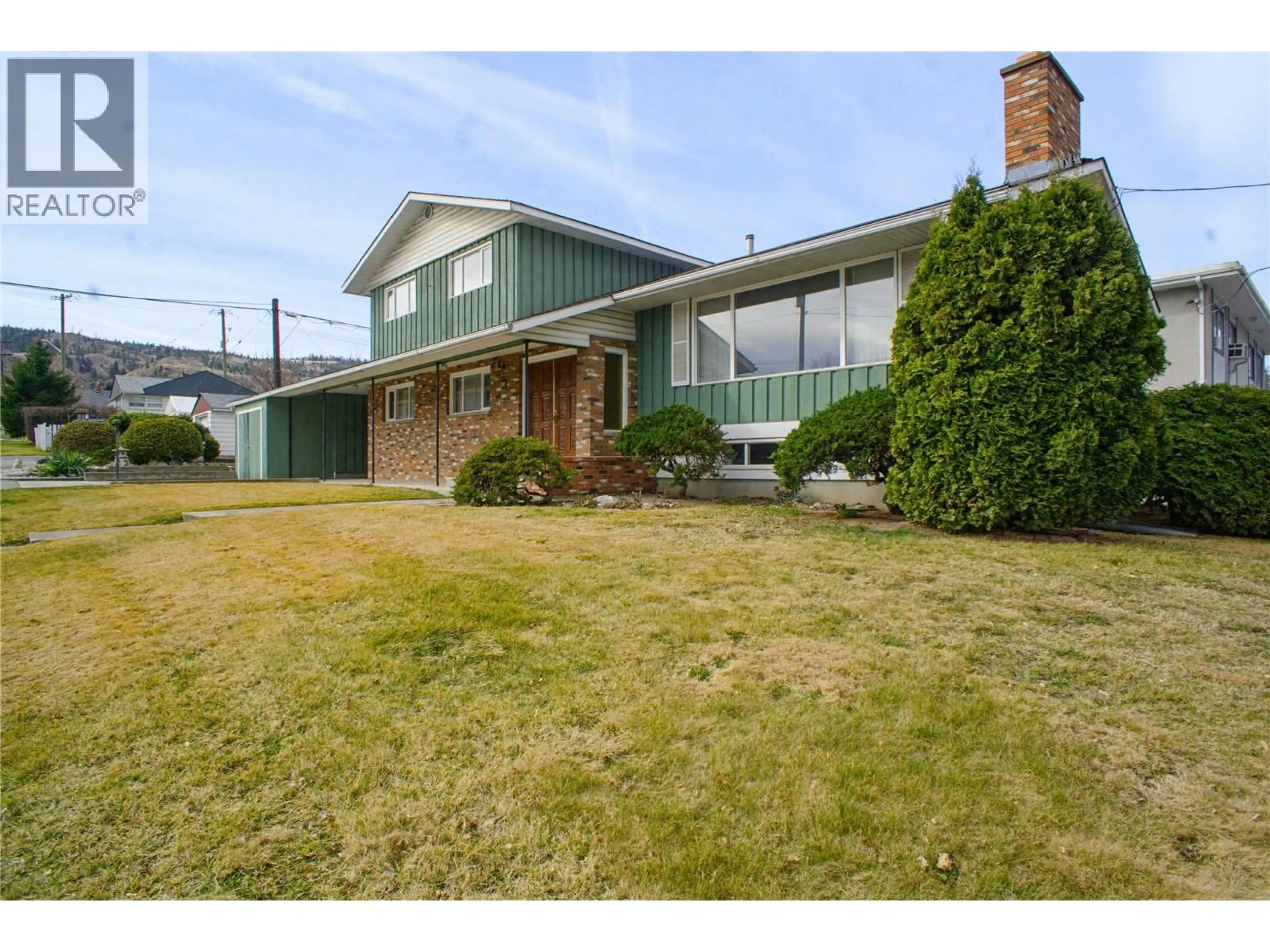 A pic from outside/outdoor area/front of a property/back of a property/a pic from drone, street for 650 13TH AVENUE, Kamloops British Columbia V2C3Y9