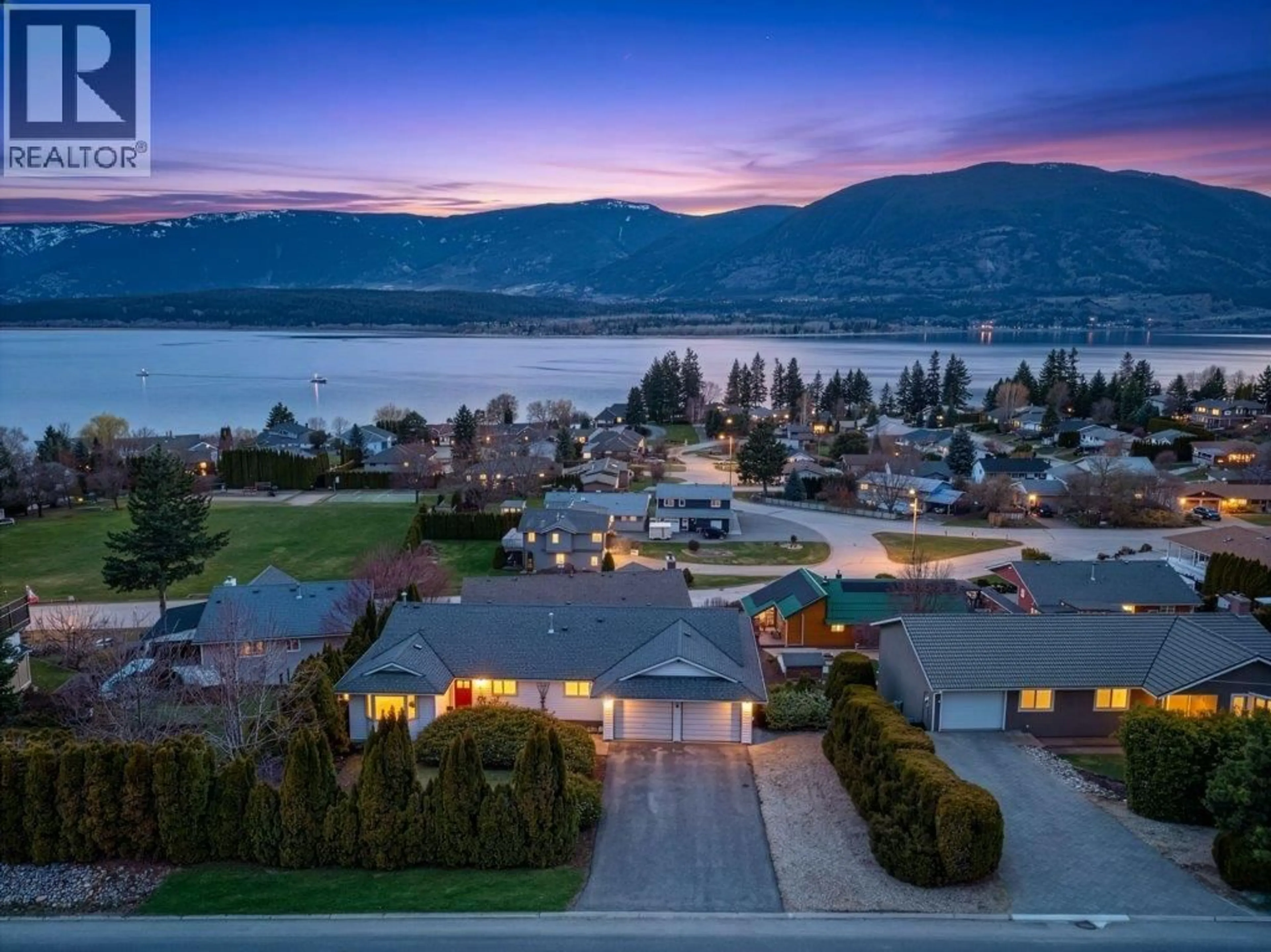 A pic from outside/outdoor area/front of a property/back of a property/a pic from drone, water/lake/river/ocean view for 4751 LAKESHORE ROAD NORTHEAST, Salmon Arm British Columbia V1E3N8
