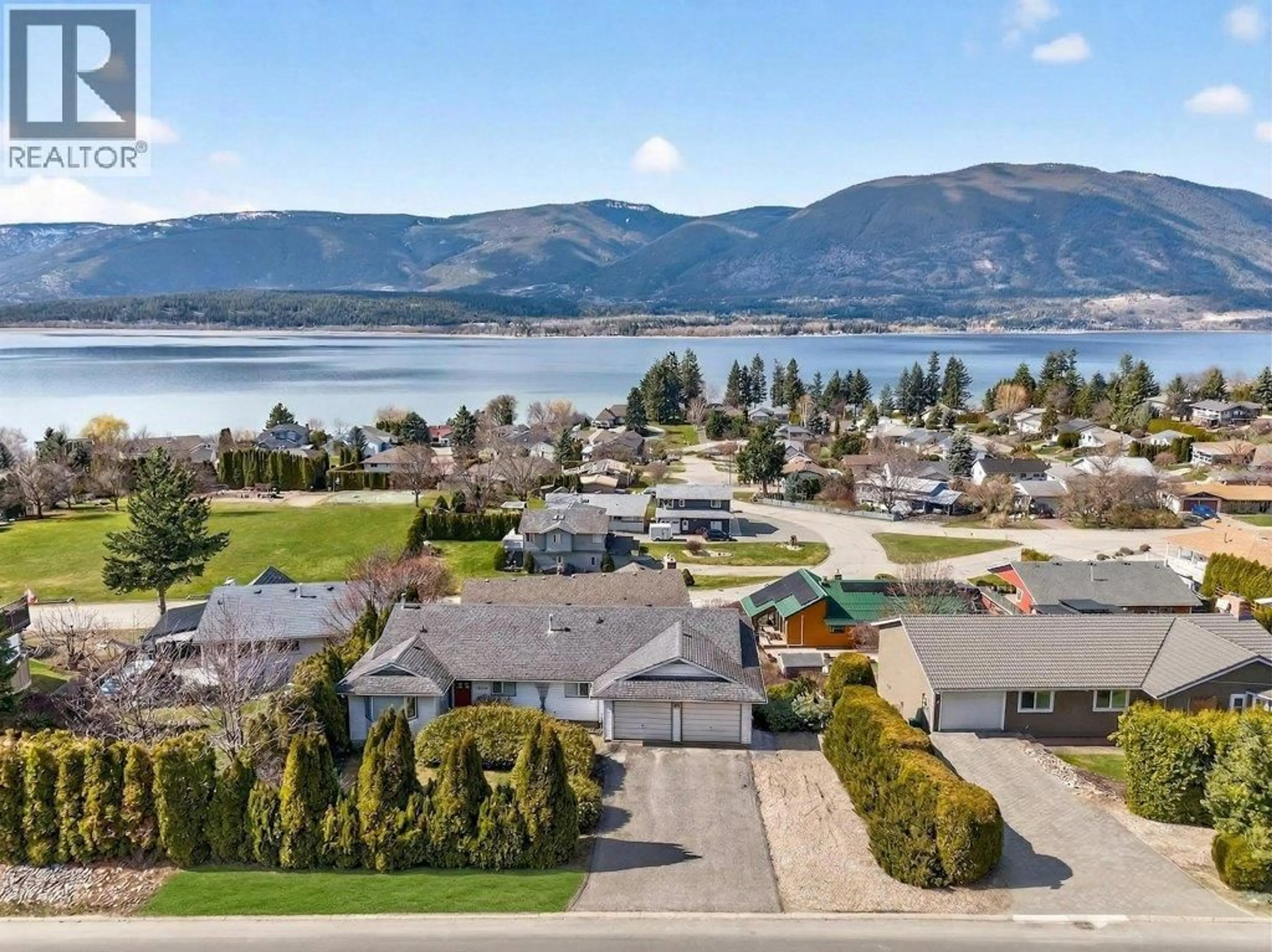 A pic from outside/outdoor area/front of a property/back of a property/a pic from drone, water/lake/river/ocean view for 4751 LAKESHORE ROAD NORTHEAST, Salmon Arm British Columbia V1E3N8