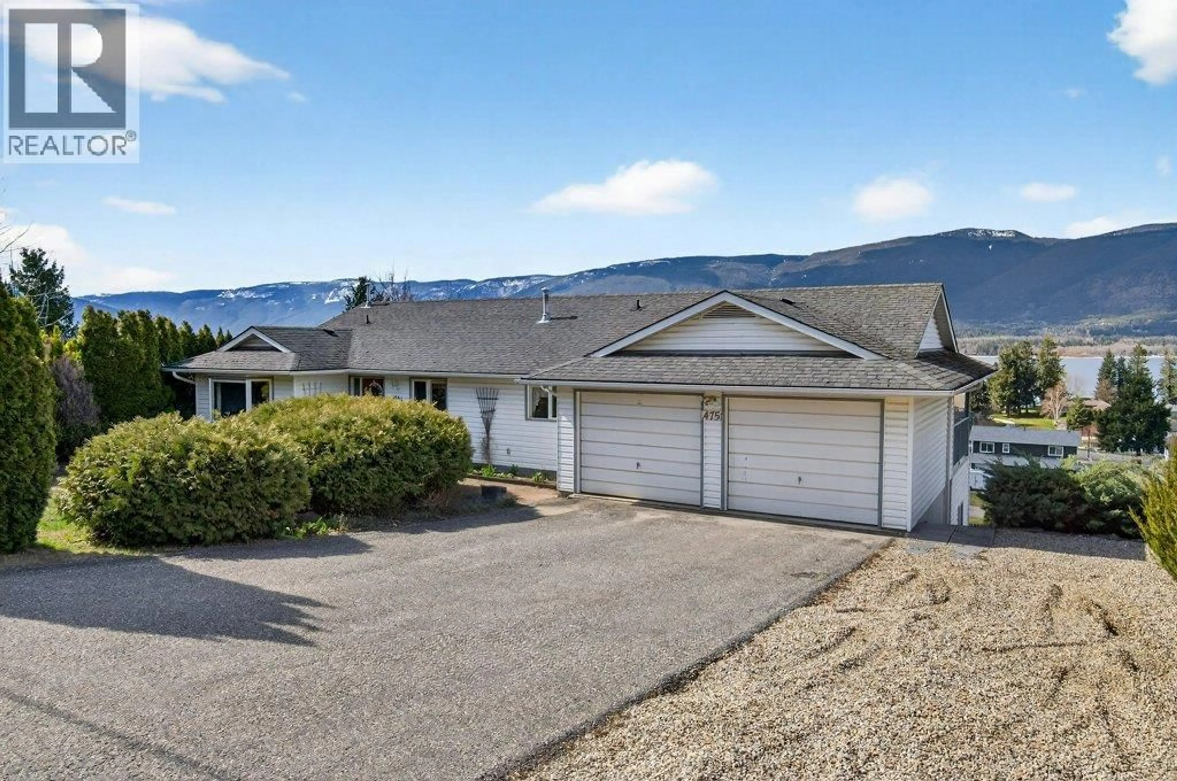 A pic from outside/outdoor area/front of a property/back of a property/a pic from drone, mountain view for 4751 LAKESHORE ROAD NORTHEAST, Salmon Arm British Columbia V1E3N8