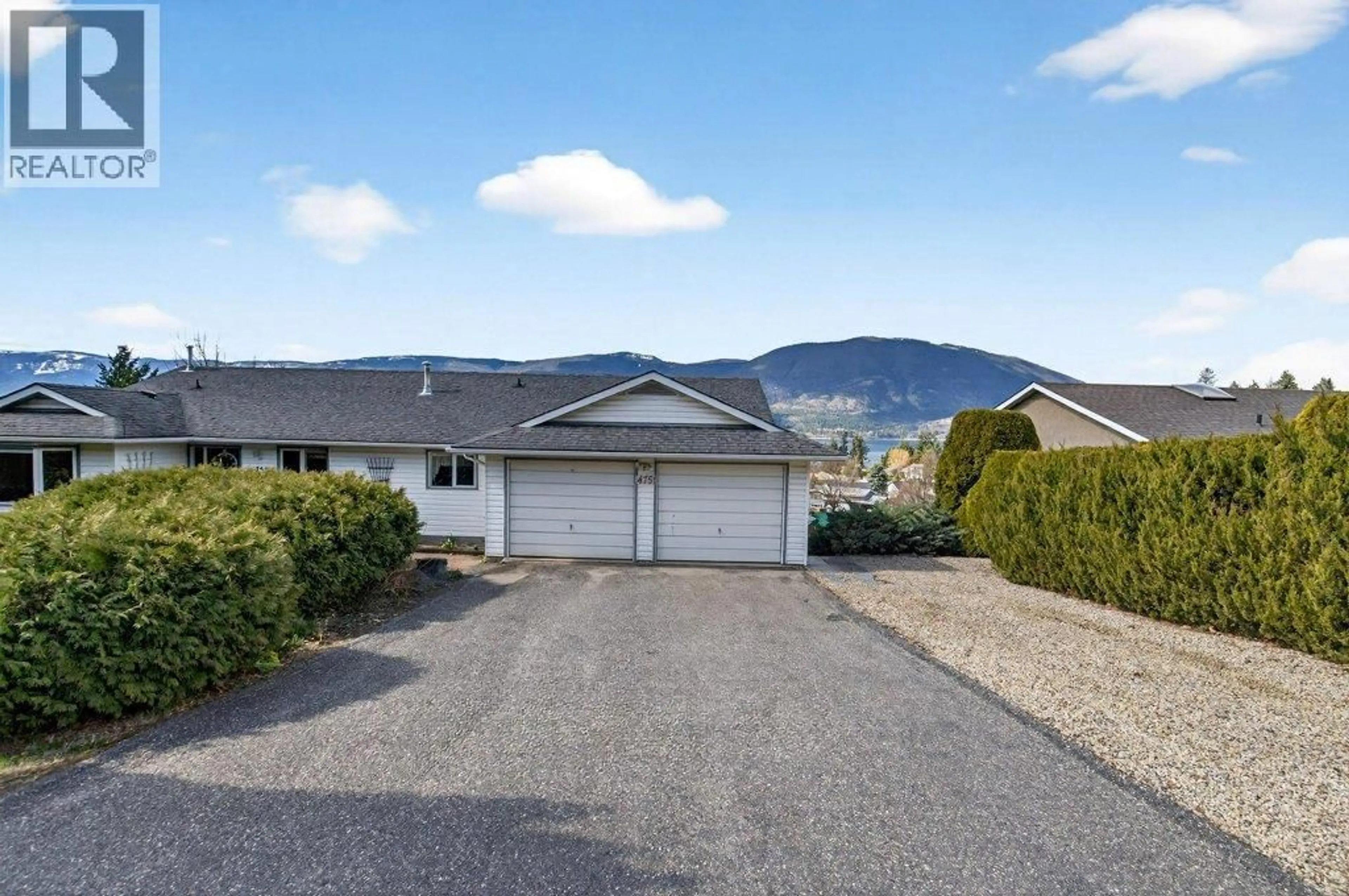 A pic from outside/outdoor area/front of a property/back of a property/a pic from drone, mountain view for 4751 LAKESHORE ROAD NORTHEAST, Salmon Arm British Columbia V1E3N8