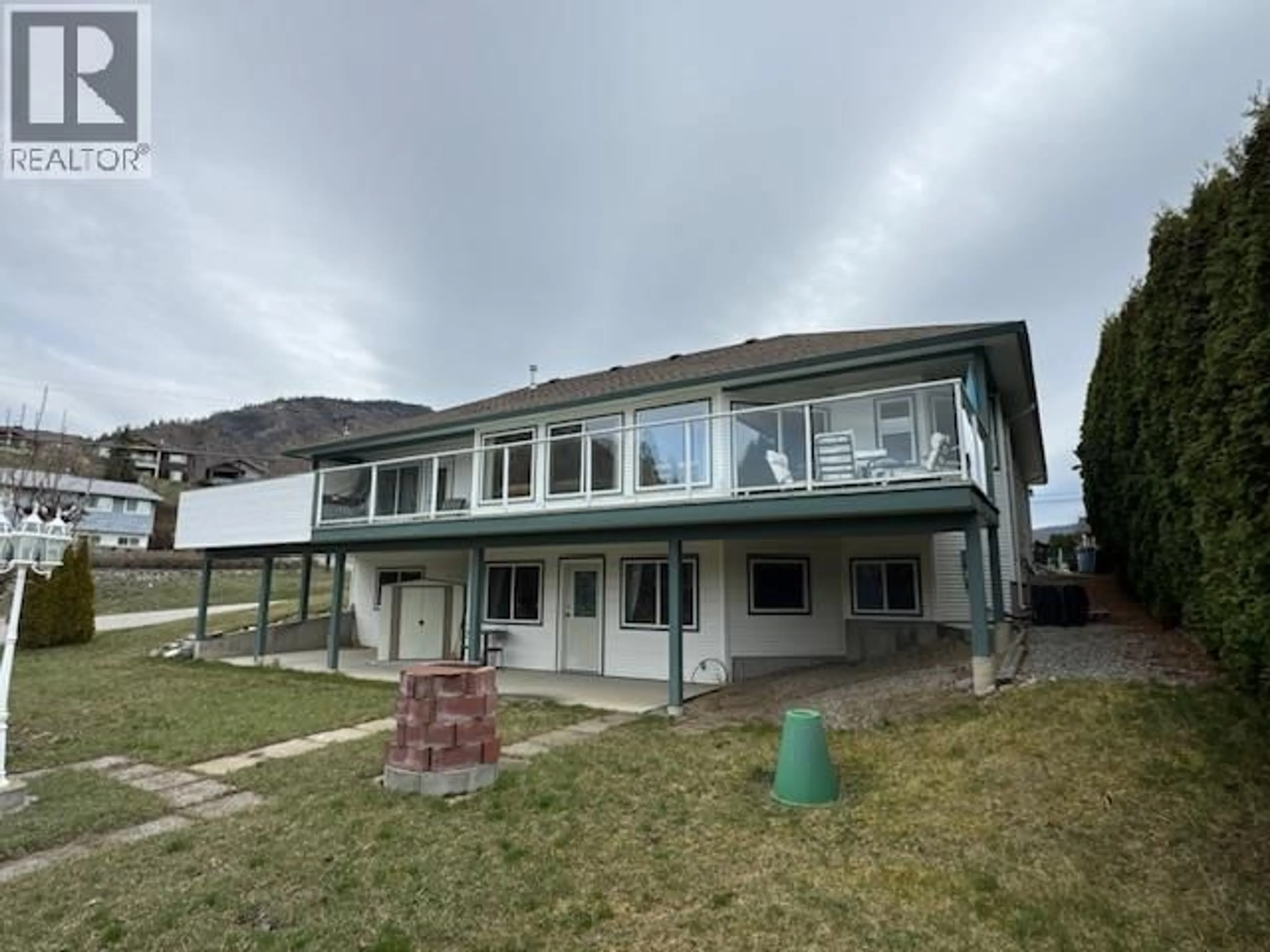 Home with vinyl exterior material, mountain view for 1366 JAYSON ROAD, Kelowna British Columbia V1P1K9