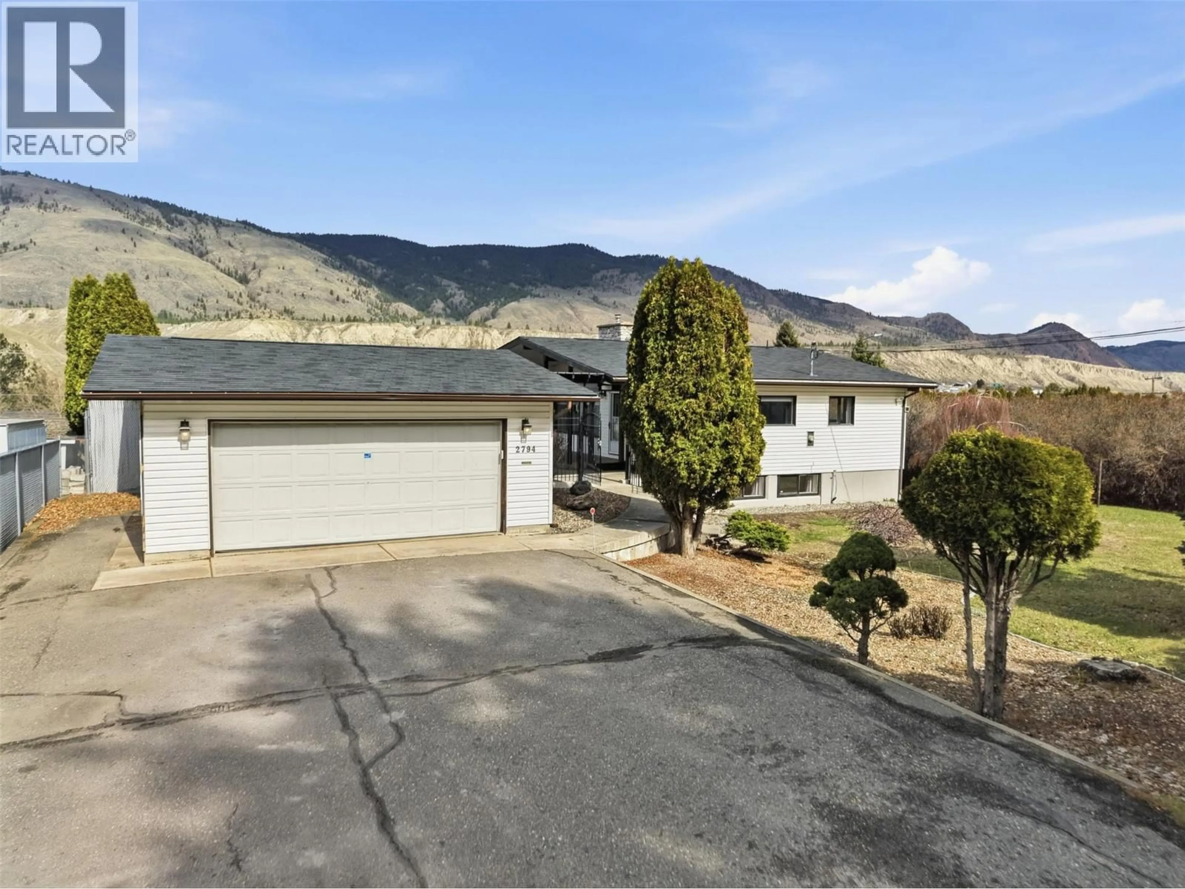 A pic from outside/outdoor area/front of a property/back of a property/a pic from drone, mountain view for 2794 SUNSET DRIVE, Kamloops British Columbia V2C4K6
