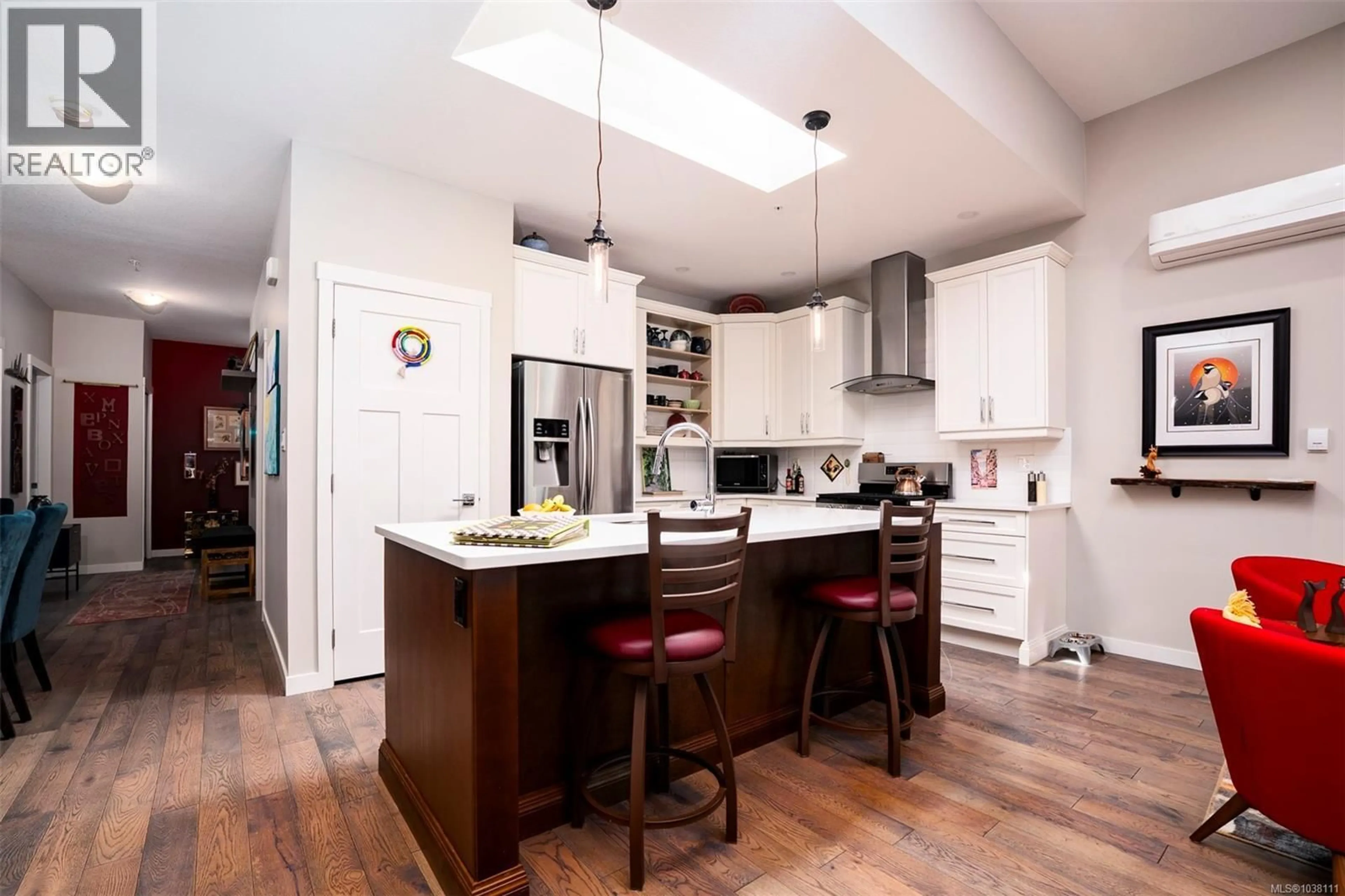 Open concept kitchen, wood/laminate floor for 4128 EMERALD WOODS PLACE, Nanaimo British Columbia V9T5P8