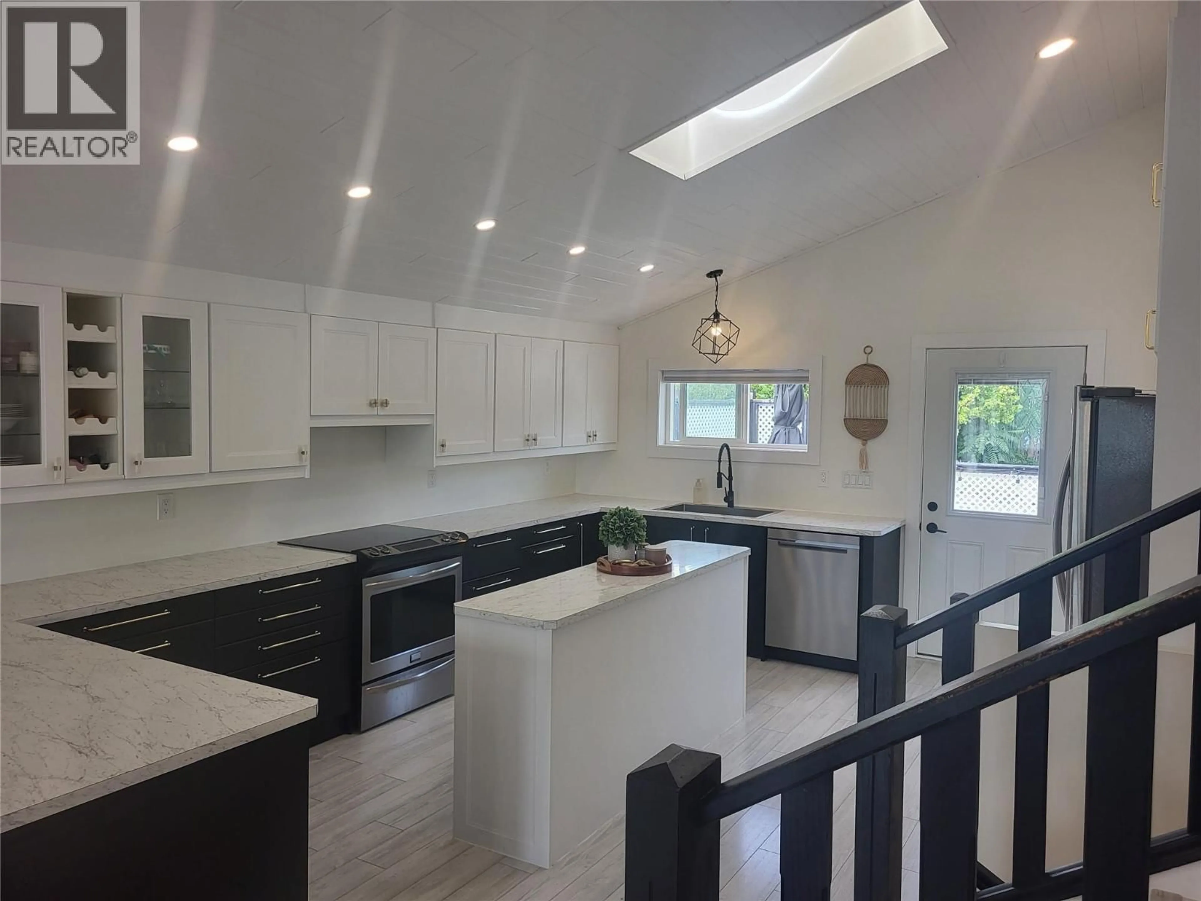 Open concept kitchen, ceramic/tile floor for 9504 HUMMINGBIRD LANE, Osoyoos British Columbia V0H1V5