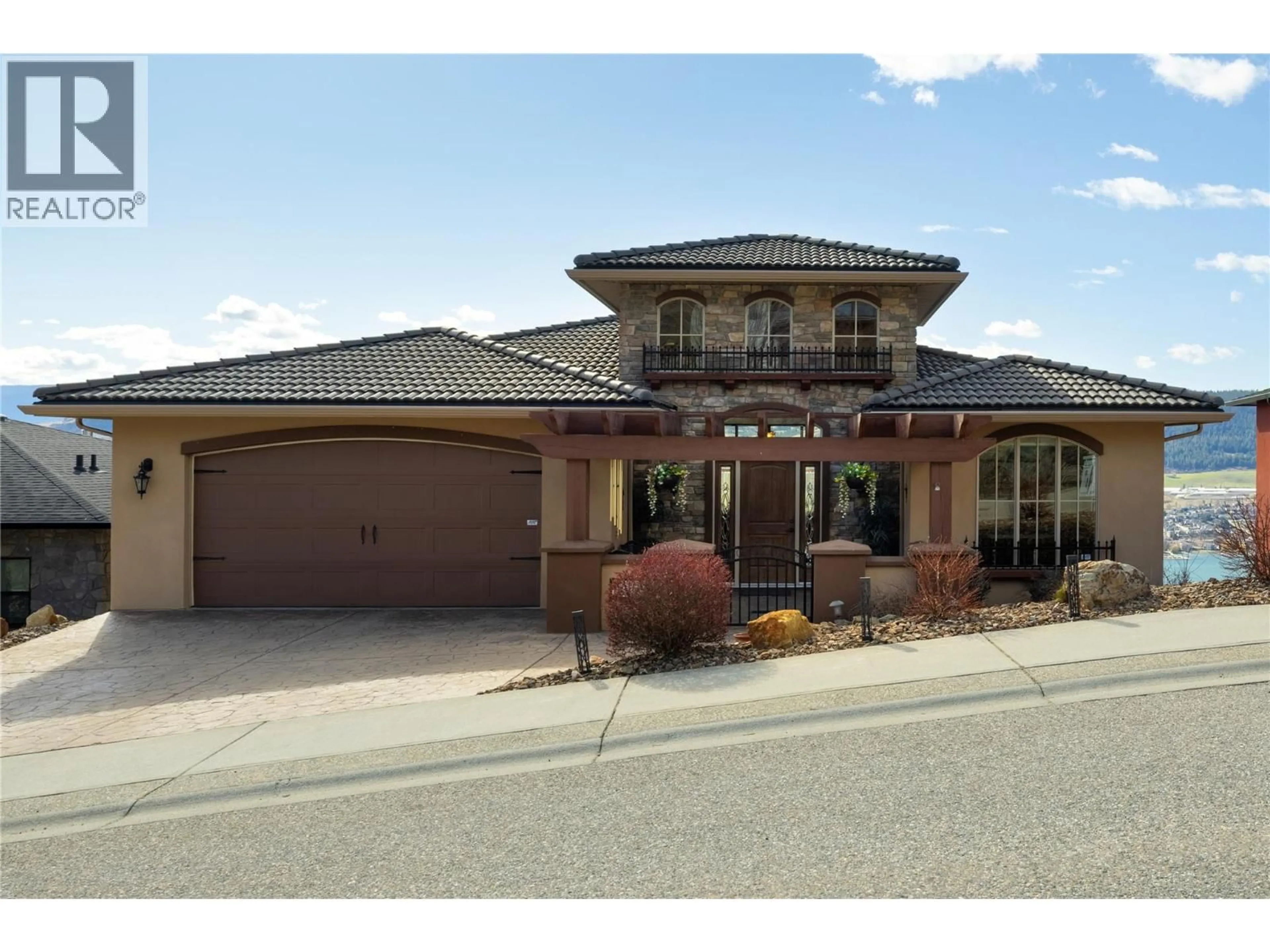 Home with brick exterior material, street for 212 HARVEST COURT, Vernon British Columbia V1H1Z8