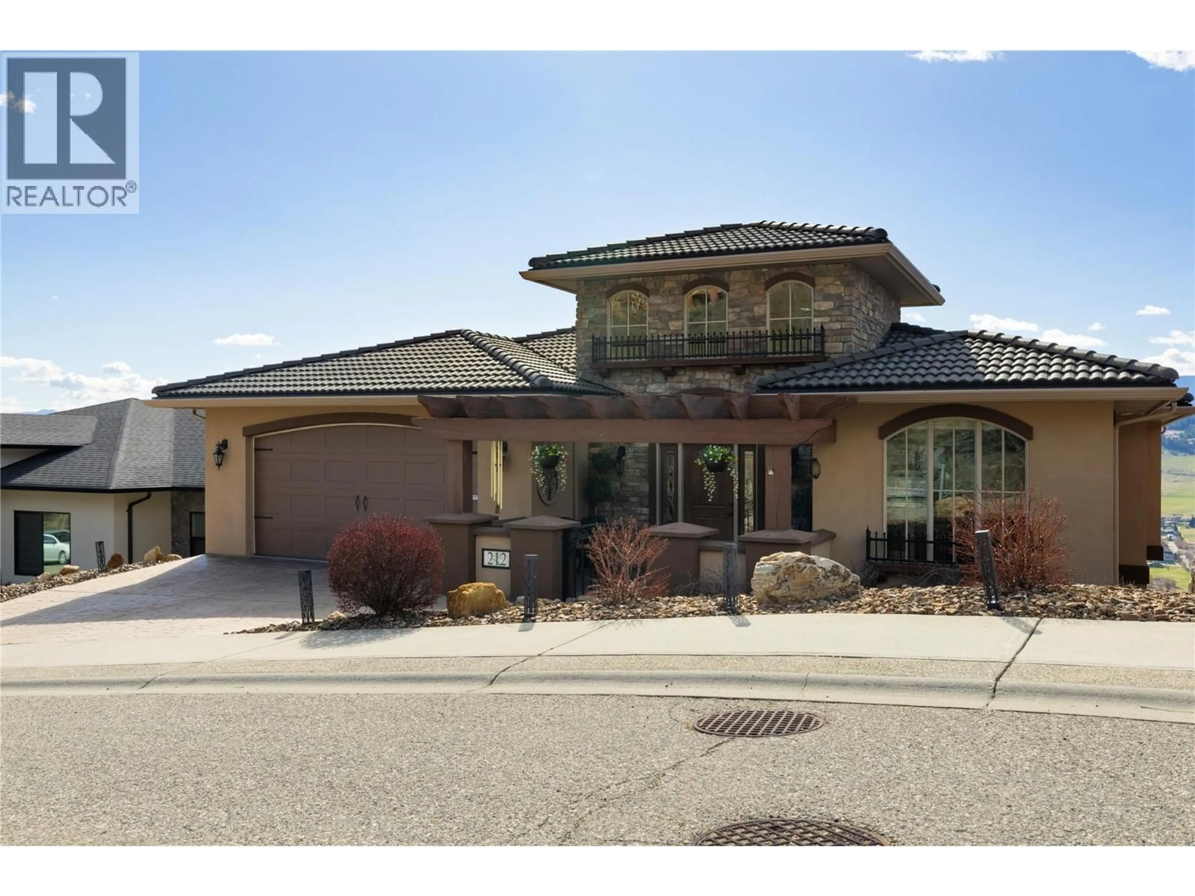 Home with brick exterior material, street for 212 HARVEST COURT, Vernon British Columbia V1H1Z8