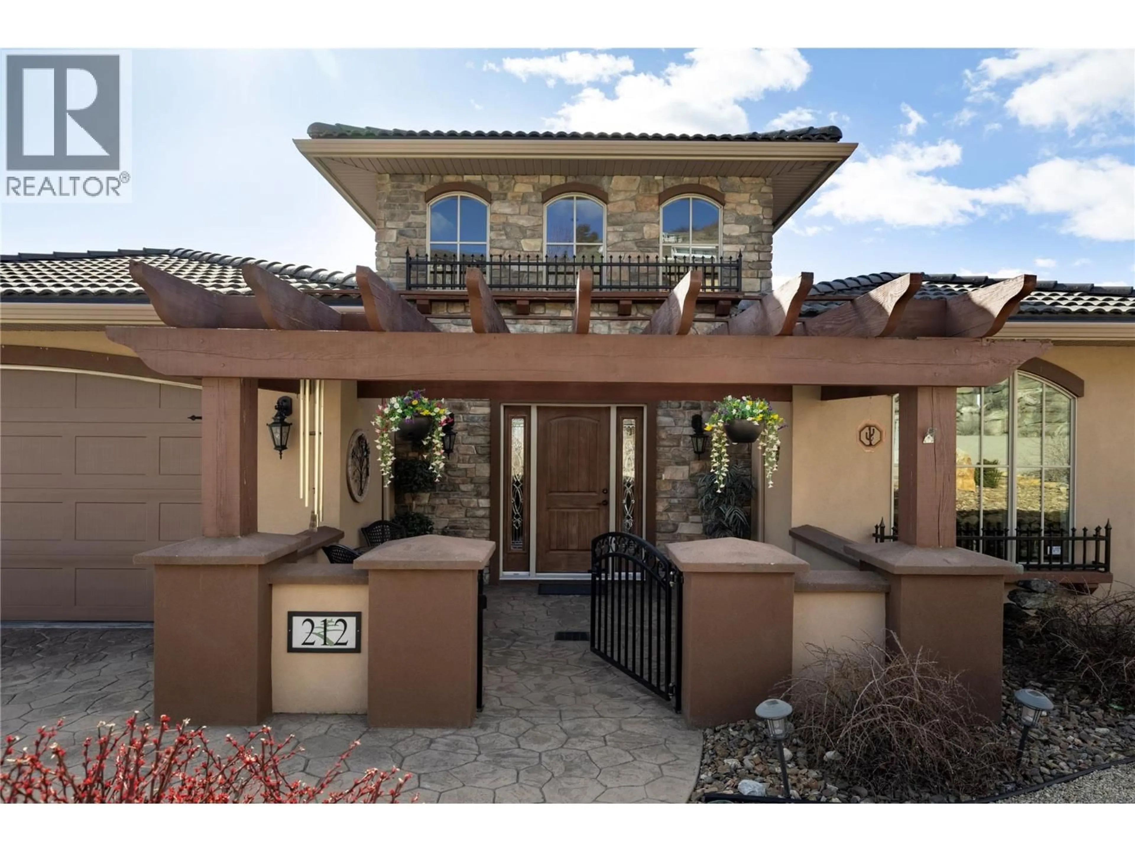 Home with brick exterior material, street for 212 HARVEST COURT, Vernon British Columbia V1H1Z8