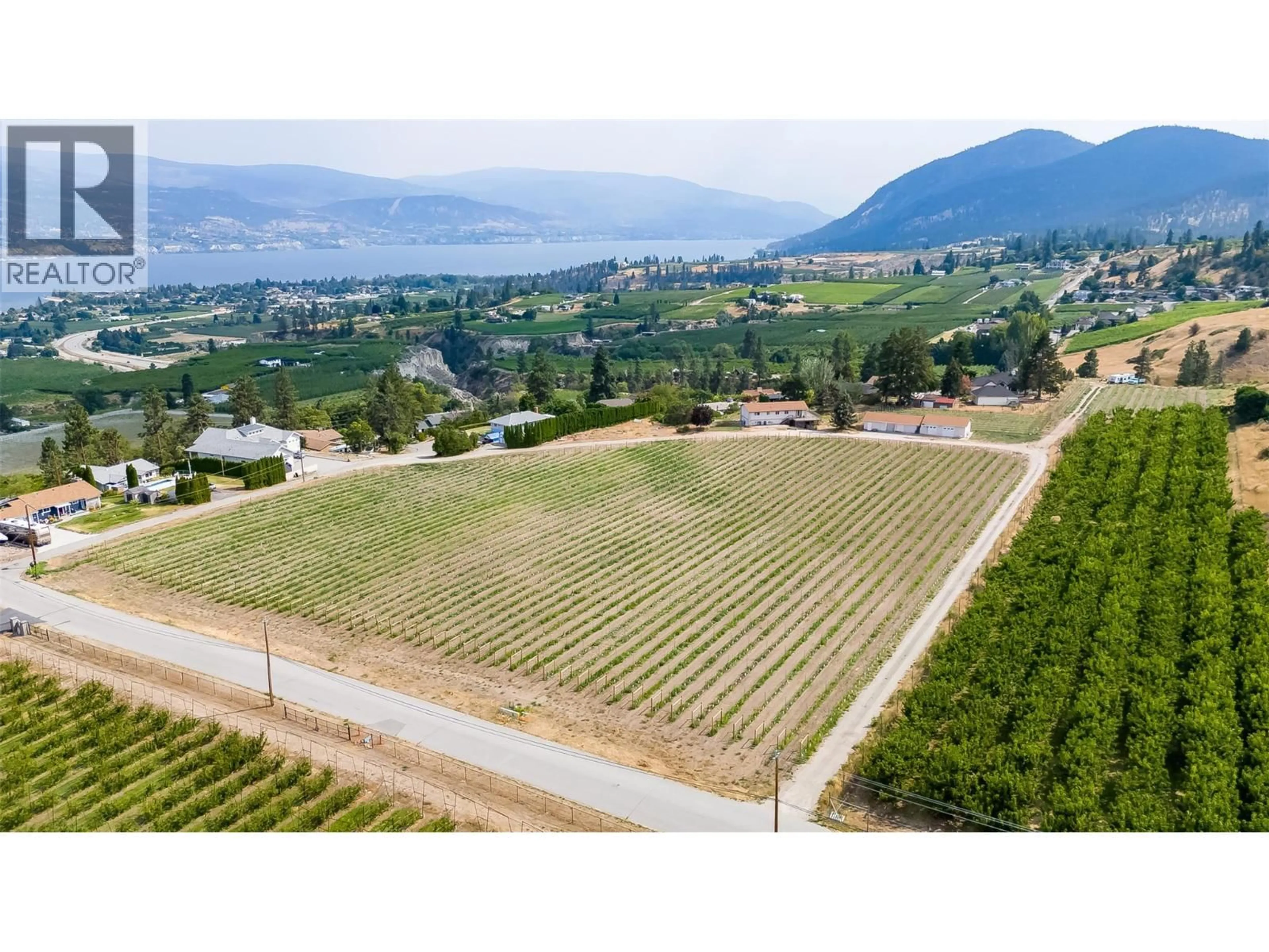 A pic from outside/outdoor area/front of a property/back of a property/a pic from drone, mountain view for 5711 WHITE STREET, Summerland British Columbia V0H1Z7
