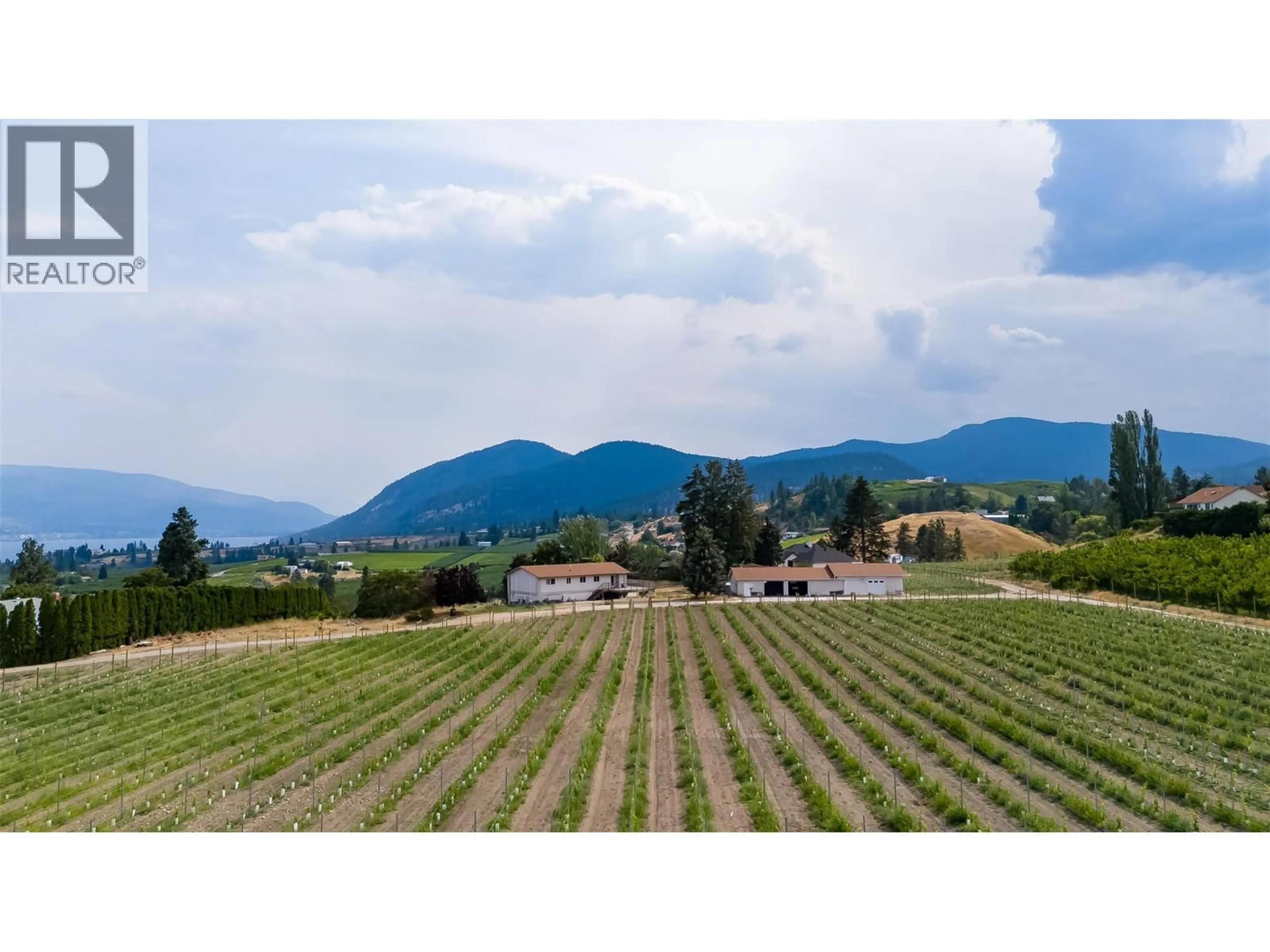 A pic from outside/outdoor area/front of a property/back of a property/a pic from drone, mountain view for 5711 WHITE STREET, Summerland British Columbia V0H1Z7