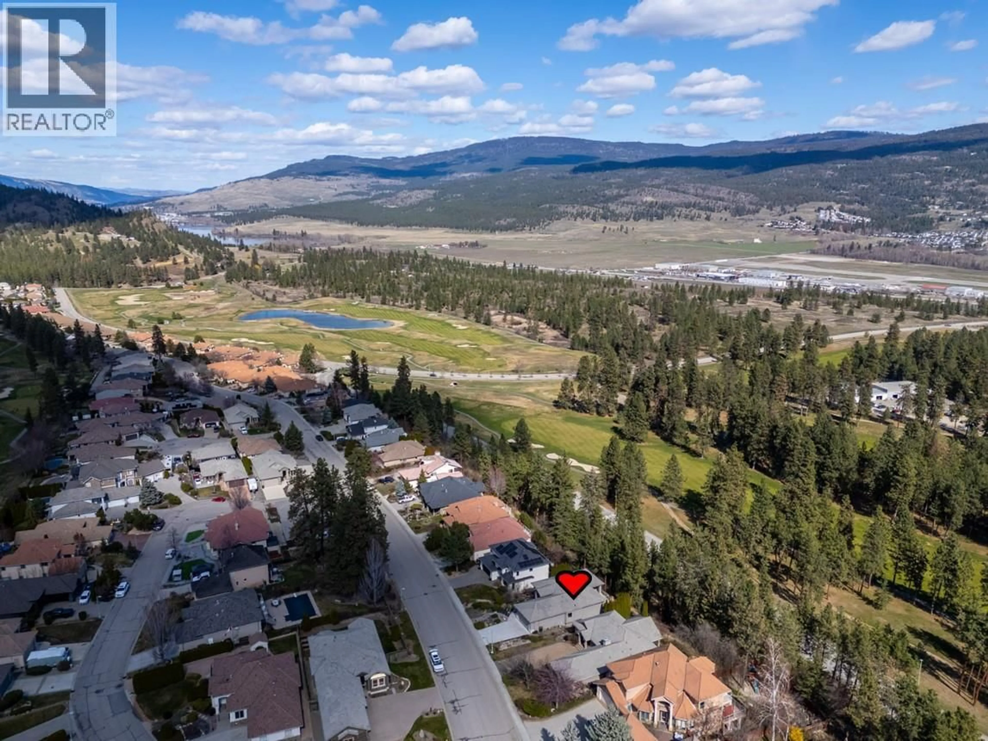 A pic from outside/outdoor area/front of a property/back of a property/a pic from drone, mountain view for 2149 CAPISTRANO DRIVE, Kelowna British Columbia V1V2A3