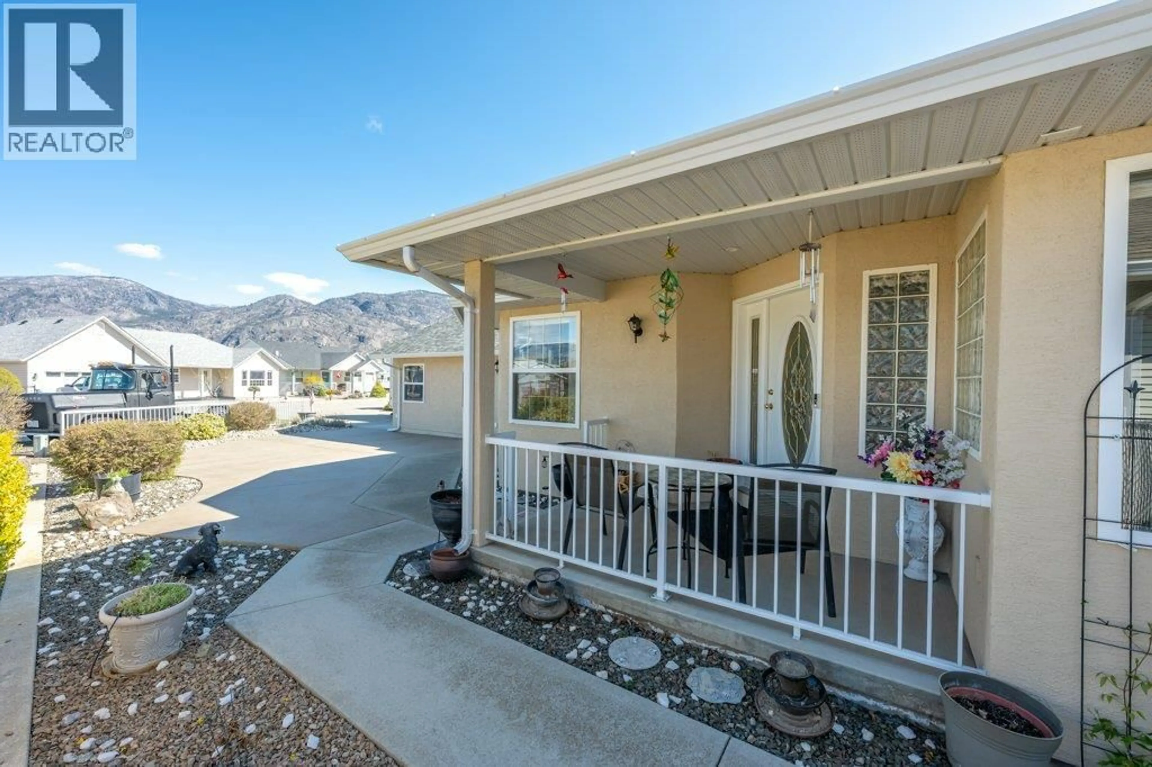 Home with vinyl exterior material, mountain view for 6 CURLEW COURT, Osoyoos British Columbia V0H1V5