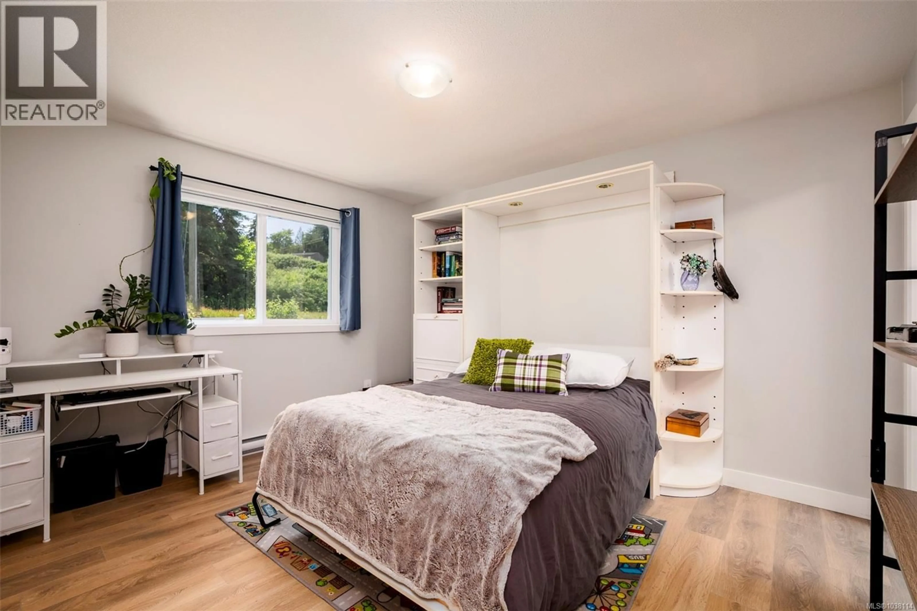 Bedroom with bed, wood/laminate floor for 3238 MALCOLM ROAD, Chemainus British Columbia V0R1K2
