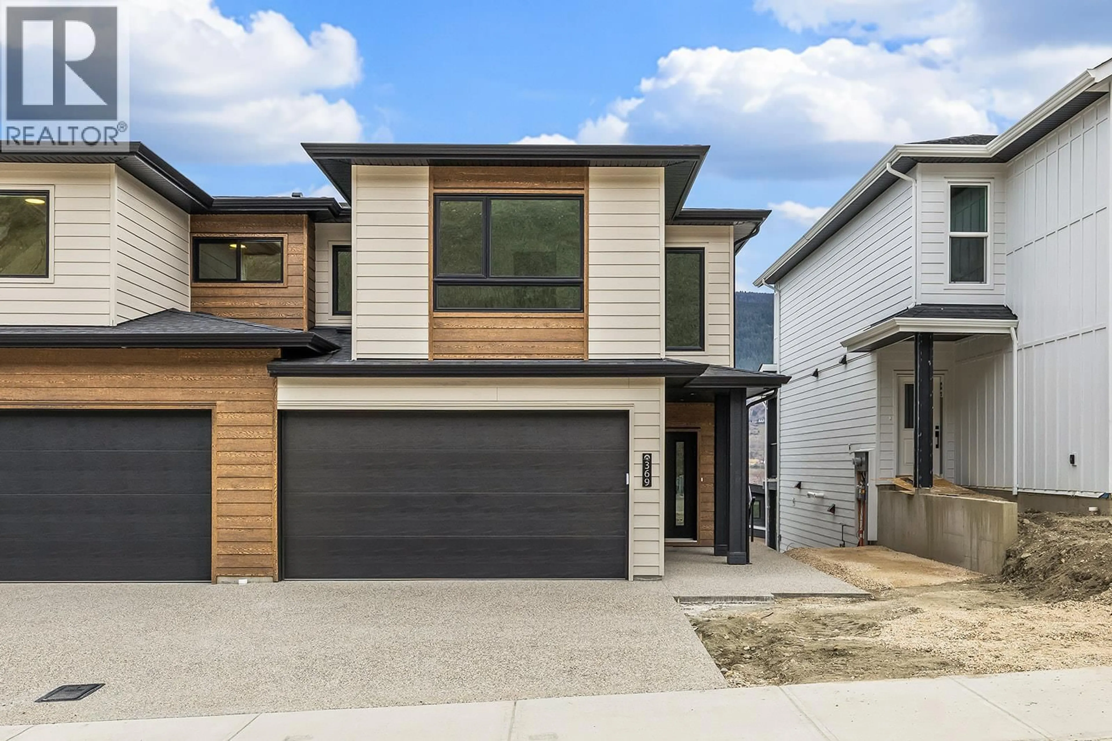 Home with brick exterior material, street for 369 ARROWLEAF RISE, Coldstream British Columbia V1B0B5