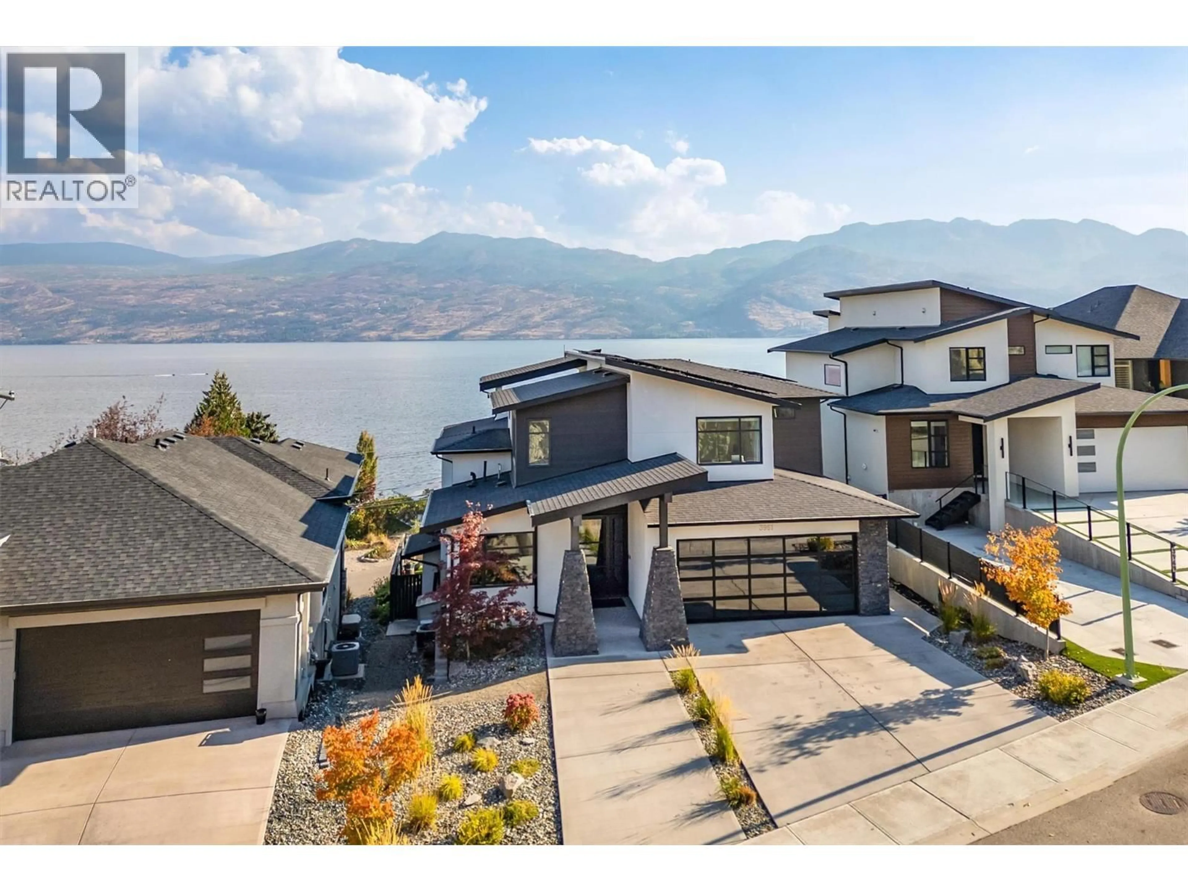 A pic from outside/outdoor area/front of a property/back of a property/a pic from drone, water/lake/river/ocean view for 3961 BEACHVIEW DRIVE EAST, West Kelowna British Columbia V4T2K1