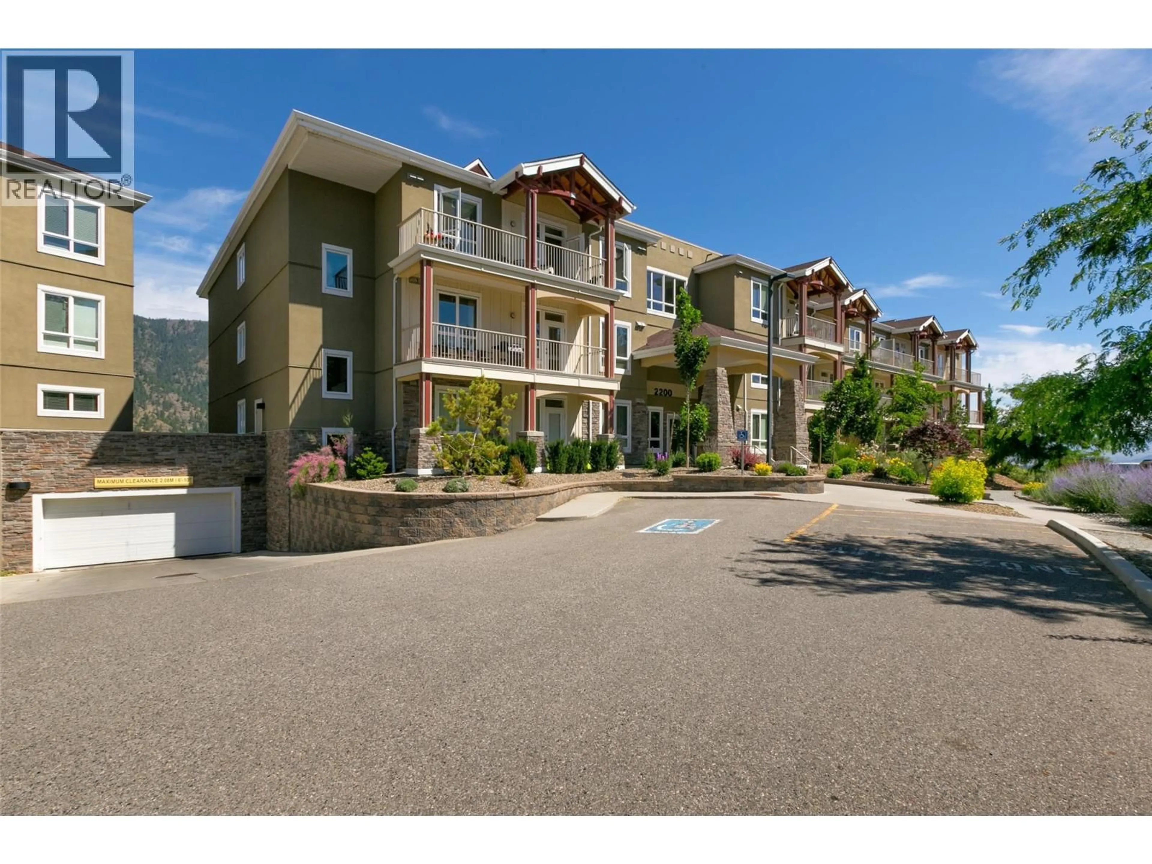 A pic from outside/outdoor area/front of a property/back of a property/a pic from drone, mountain view for 2309 - 2200 UPPER SUNDANCE DRIVE, West Kelowna British Columbia V4T3E8