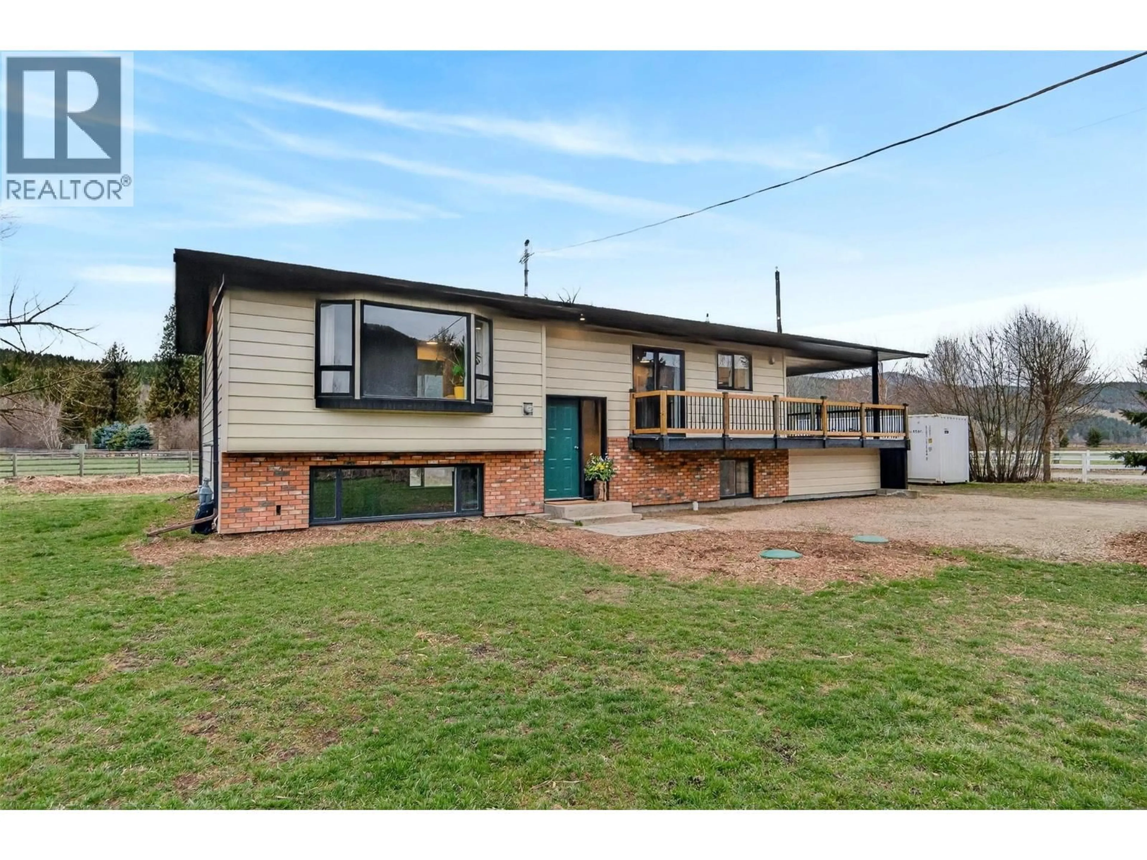 A pic from outside/outdoor area/front of a property/back of a property/a pic from drone, street for 56 TOMKINSON ROAD, Grindrod British Columbia V0E1Y0