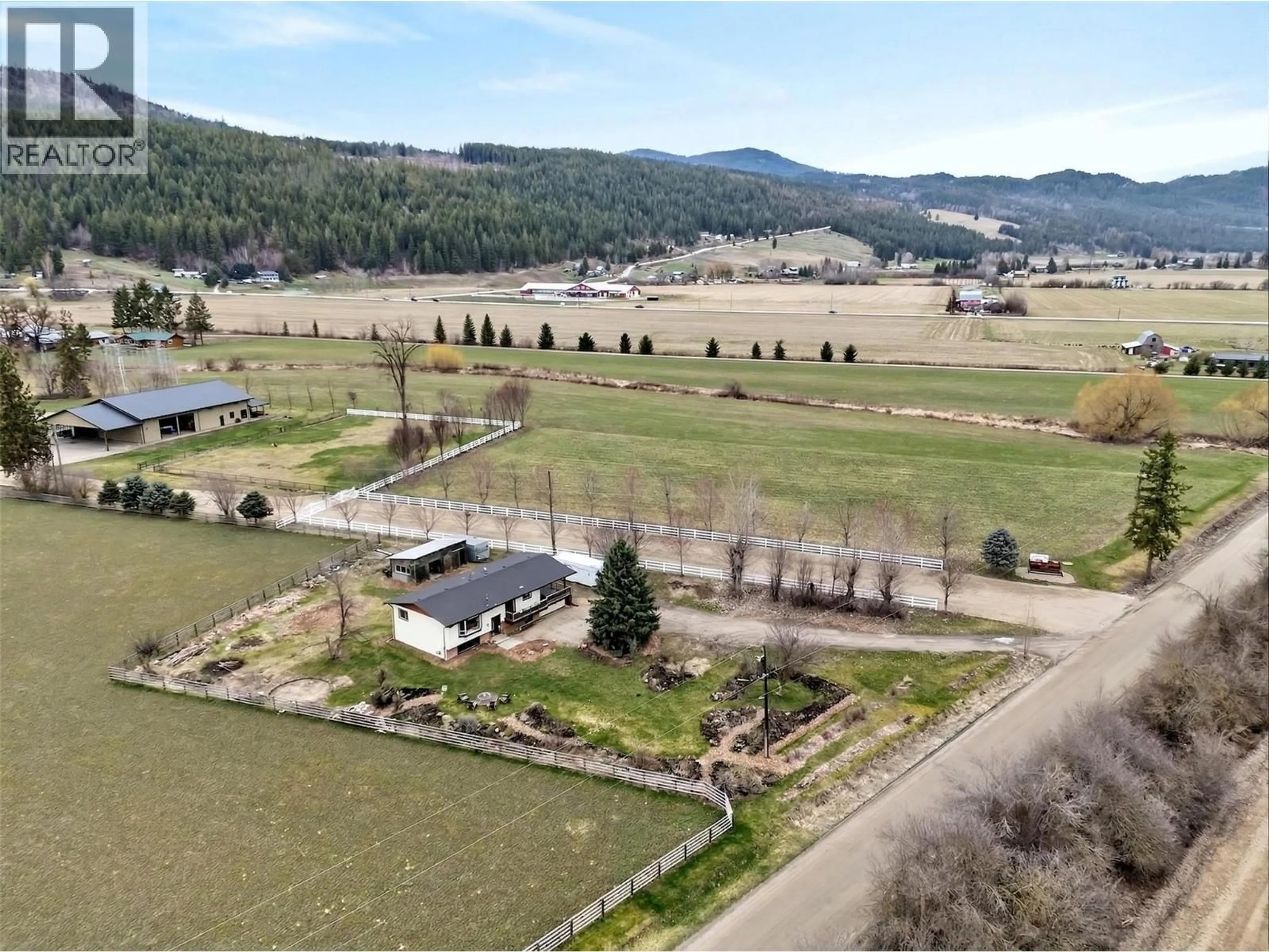 A pic from outside/outdoor area/front of a property/back of a property/a pic from drone, mountain view for 56 TOMKINSON ROAD, Grindrod British Columbia V0E1Y0