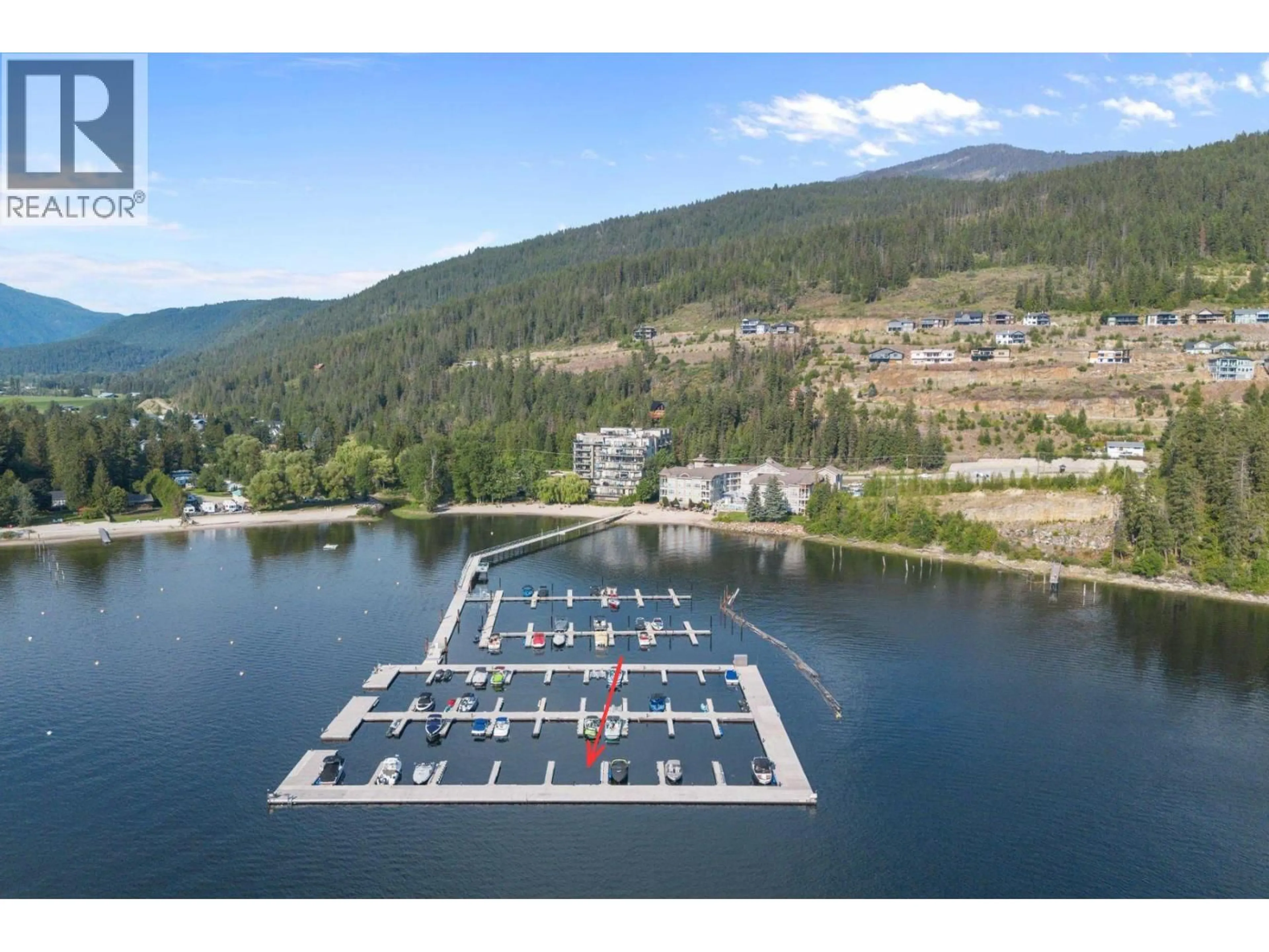 A pic from outside/outdoor area/front of a property/back of a property/a pic from drone, water/lake/river/ocean view for 408 - 326 MARA LAKE LANE, Sicamous British Columbia V0E2V1