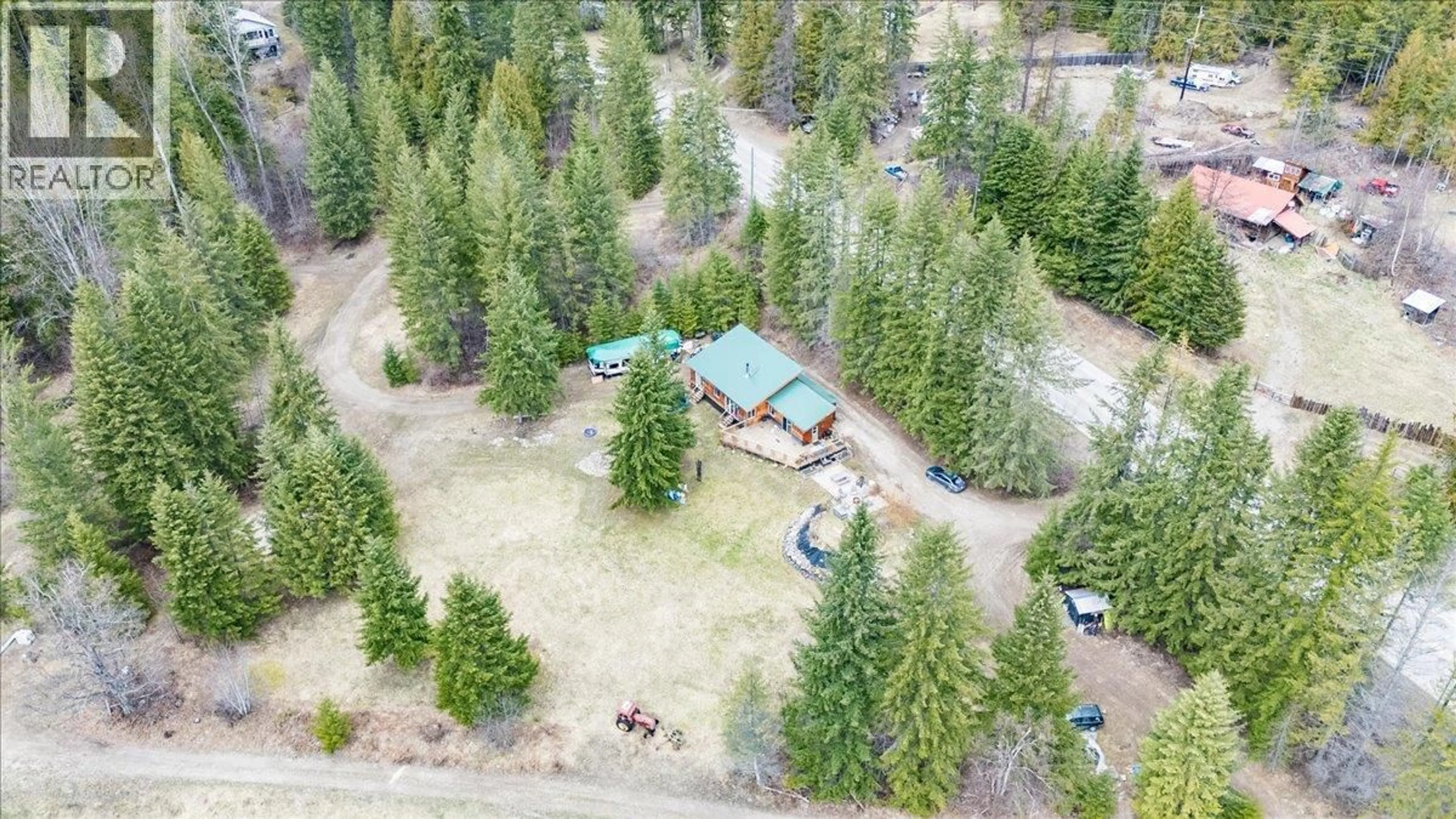 A pic from outside/outdoor area/front of a property/back of a property/a pic from drone, forest/trees view for 4675 6 HIGHWAY, Hills British Columbia V0G1S0