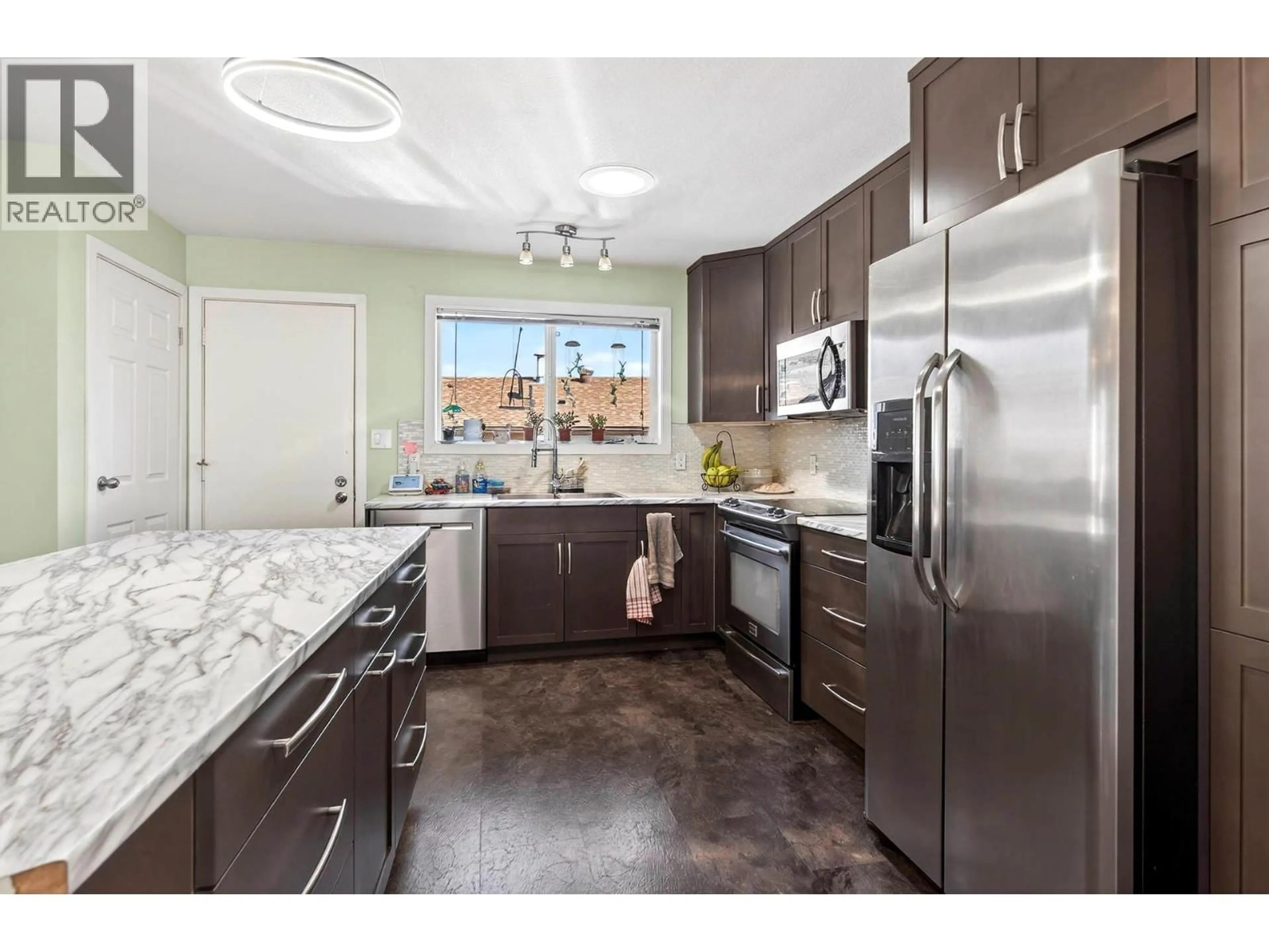 Open concept kitchen, ceramic/tile floor for 562 PINE STREET, Ashcroft British Columbia V0K1A0