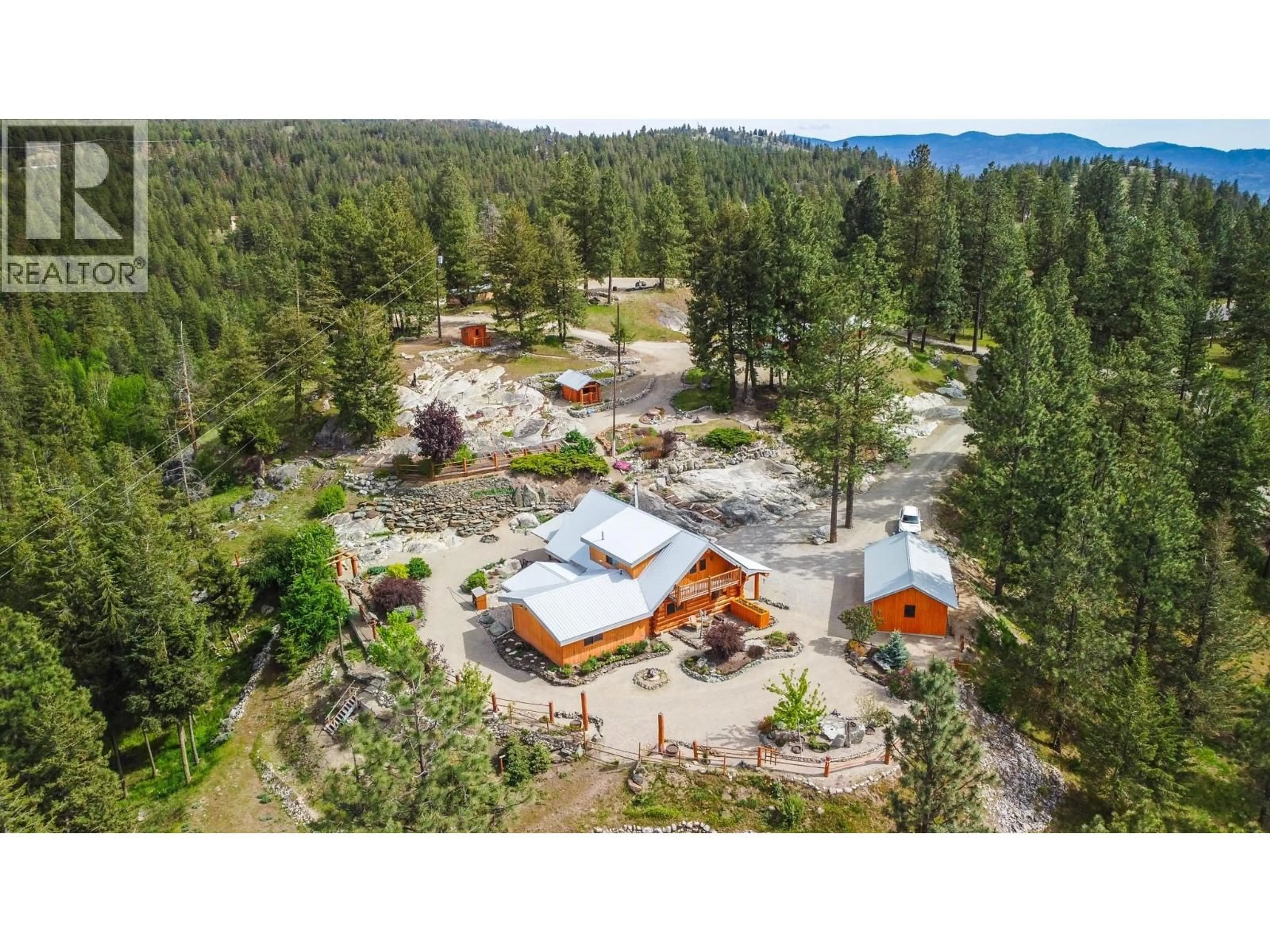 A pic from outside/outdoor area/front of a property/back of a property/a pic from drone, mountain view for 118 MAGUIRE ROAD, Osoyoos British Columbia V0H1V6