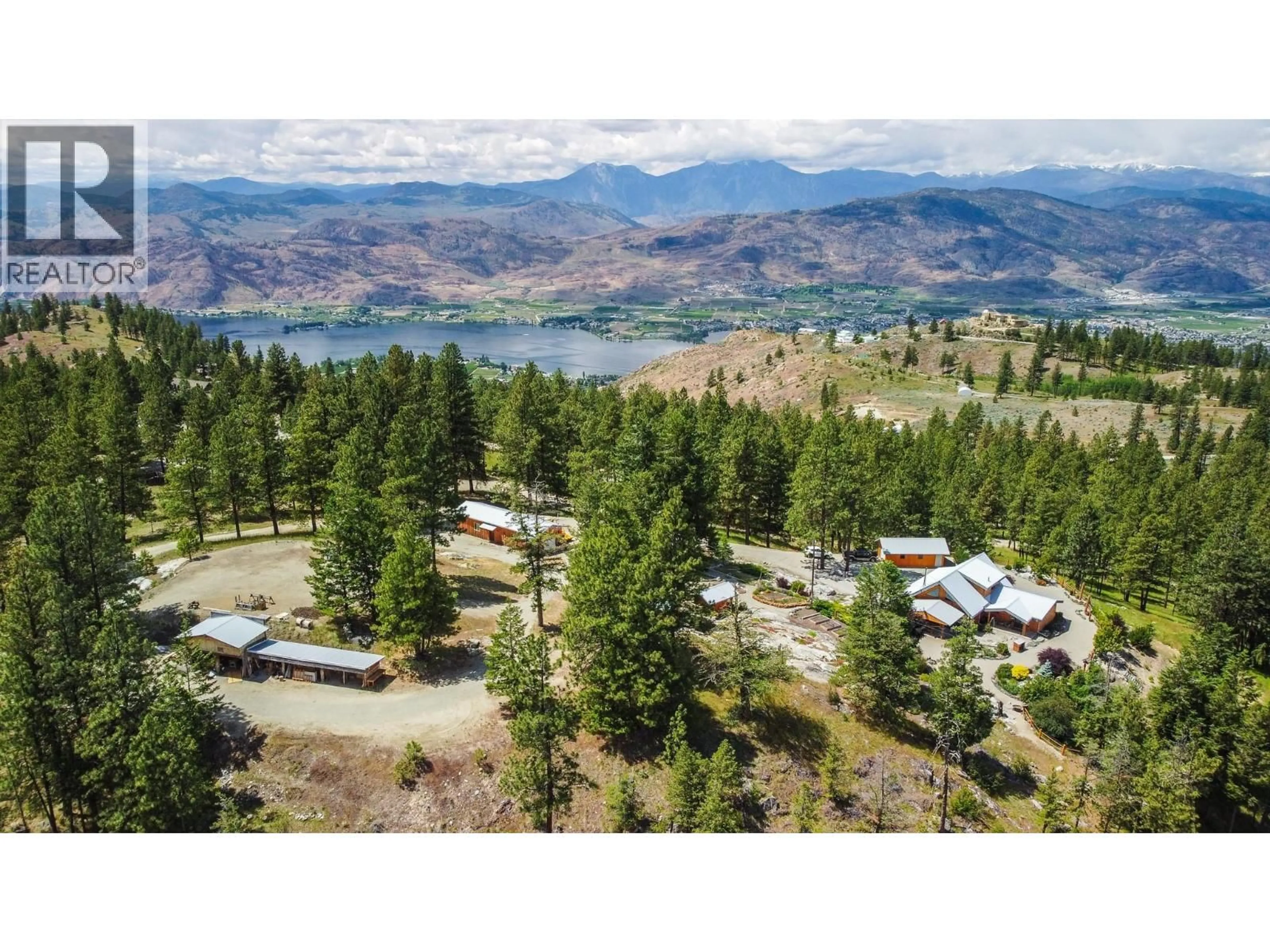 A pic from outside/outdoor area/front of a property/back of a property/a pic from drone, mountain view for 118 MAGUIRE ROAD, Osoyoos British Columbia V0H1V6
