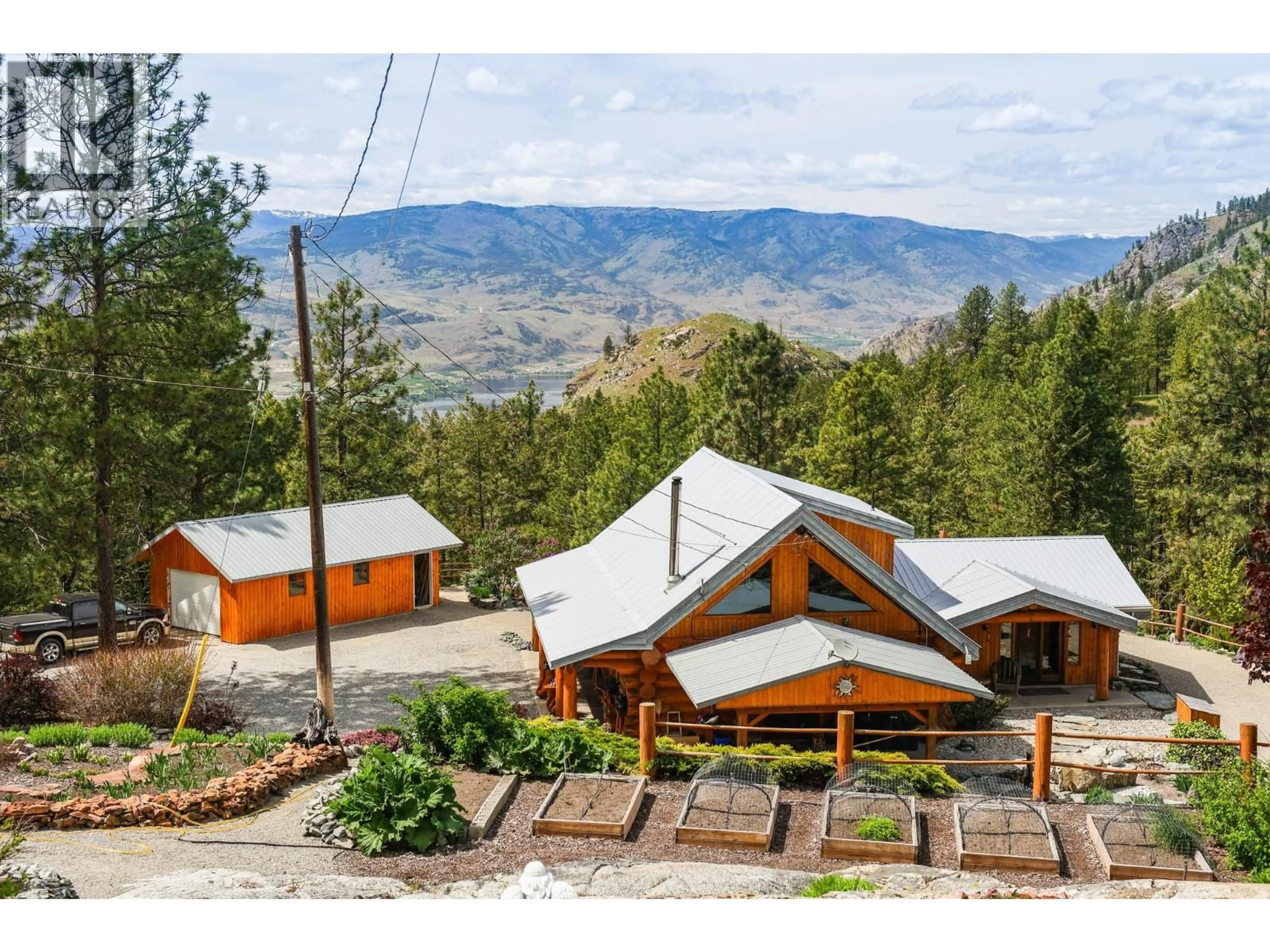 A pic from outside/outdoor area/front of a property/back of a property/a pic from drone, mountain view for 118 MAGUIRE ROAD, Osoyoos British Columbia V0H1V6