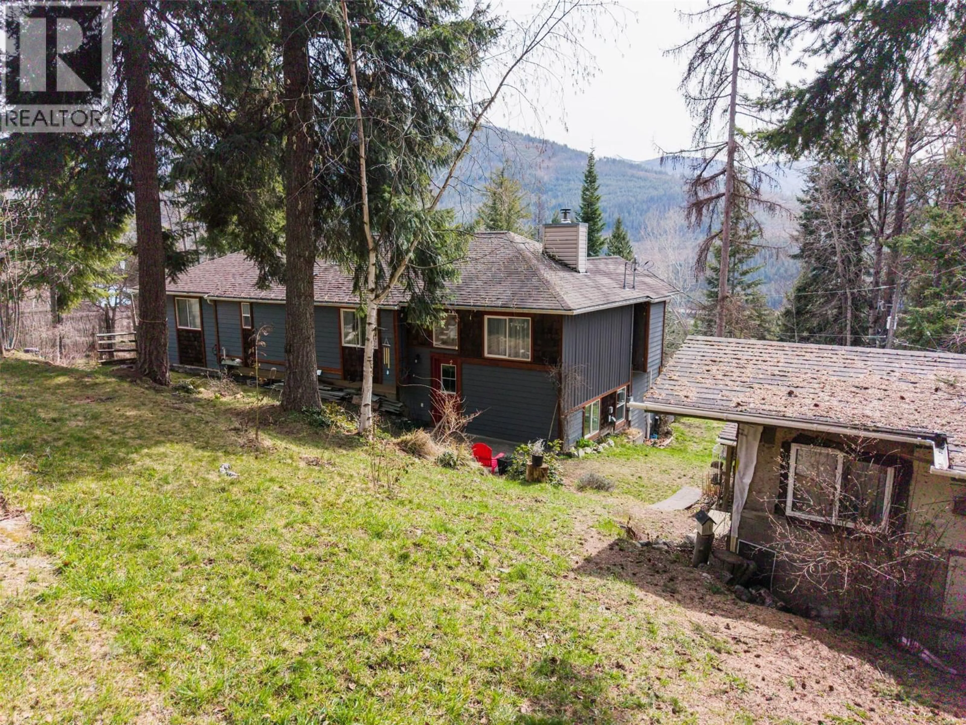 A pic from outside/outdoor area/front of a property/back of a property/a pic from drone, mountain view for 3811 AARON ROAD, Bonnington British Columbia V0G2G3