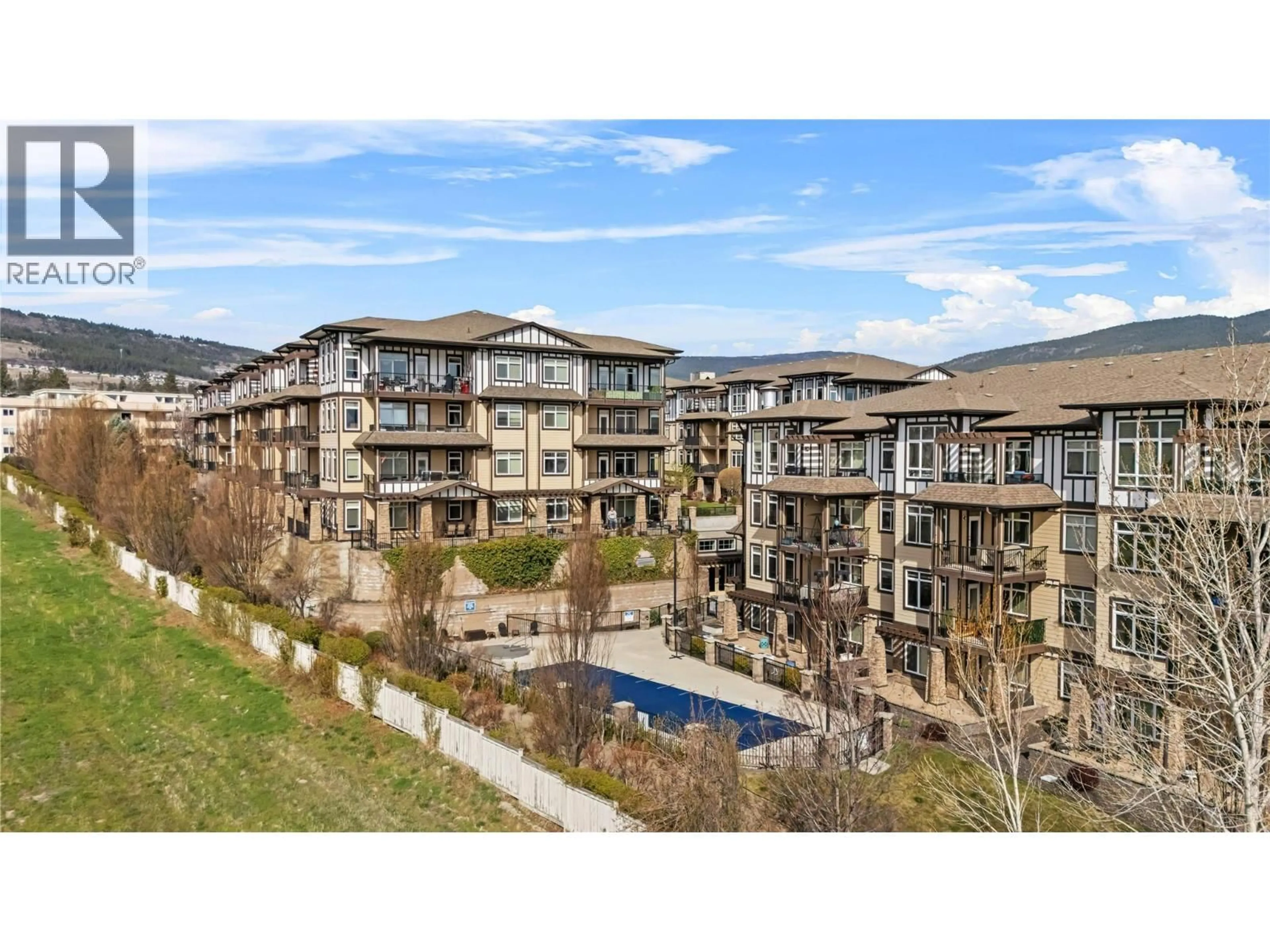 A pic from outside/outdoor area/front of a property/back of a property/a pic from drone, mountain view for 2213 - 3843 BROWN ROAD, West Kelowna British Columbia V4T2J3