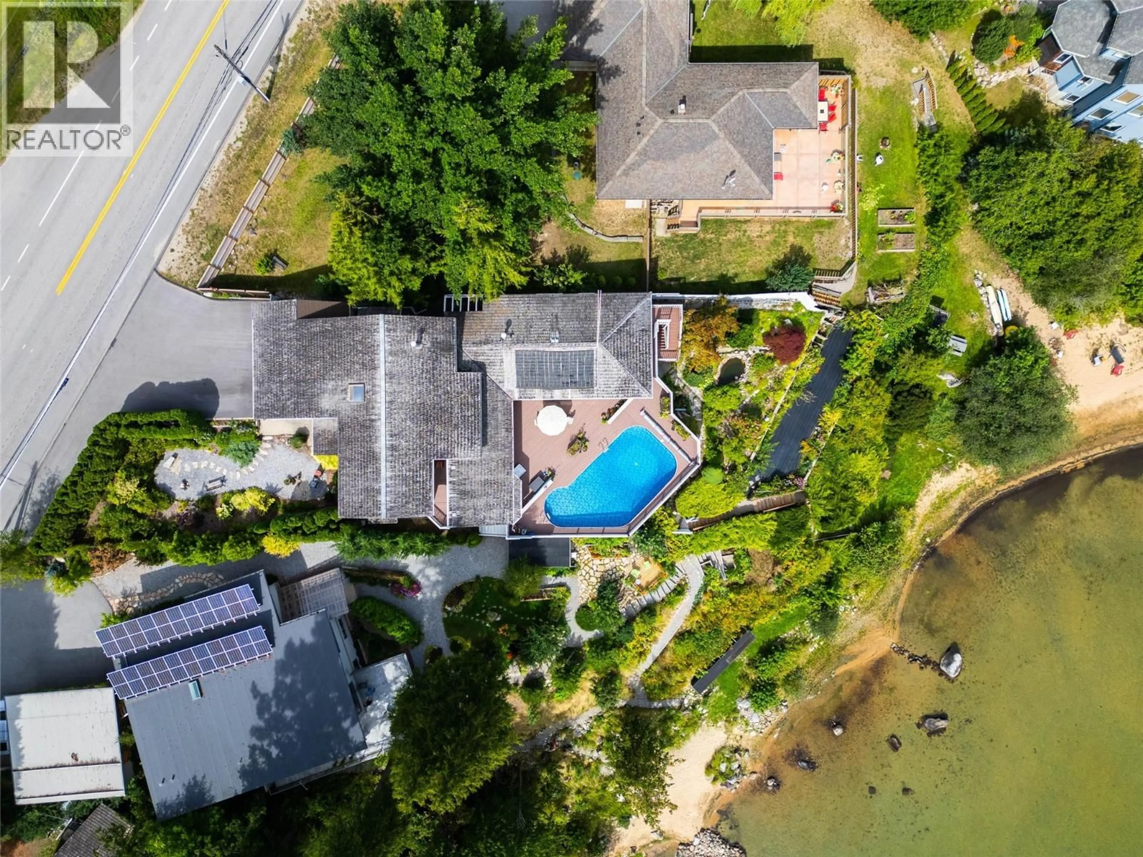 A pic from outside/outdoor area/front of a property/back of a property/a pic from drone, water/lake/river/ocean view for 1896 3A HIGHWAY, Nelson British Columbia V1L6K1