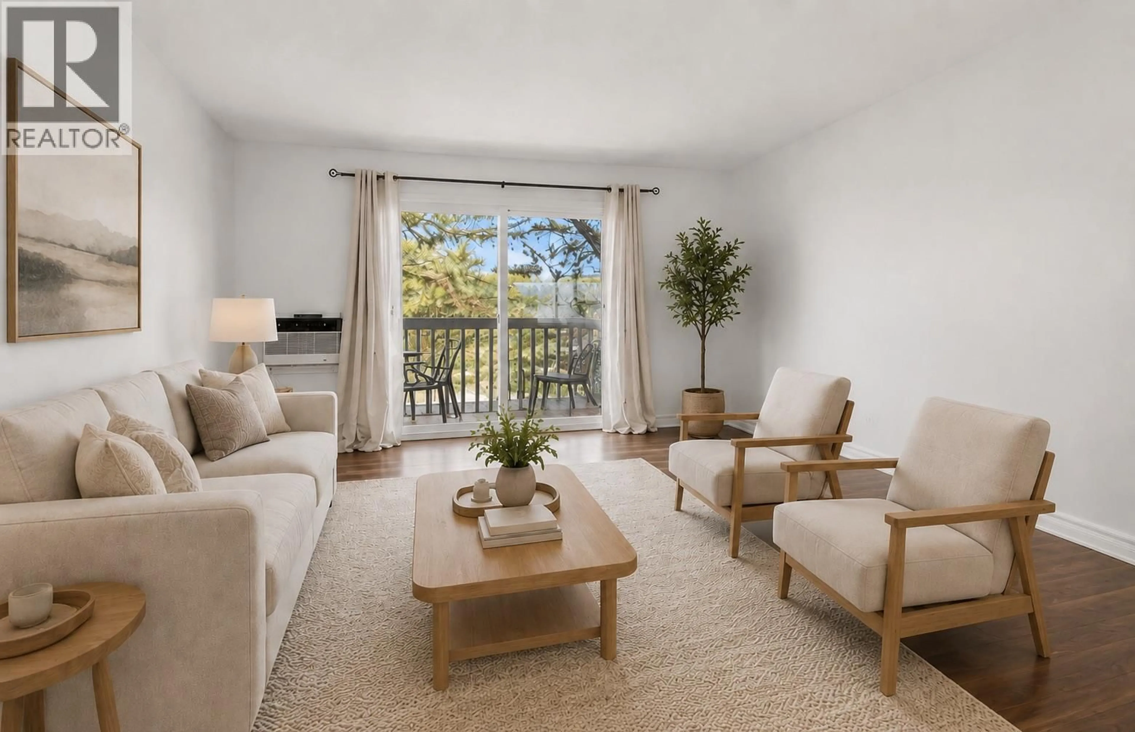 Living room with furniture, carpet floor for 201 - 135 WOODS ROAD, Kelowna British Columbia V1X6Z3