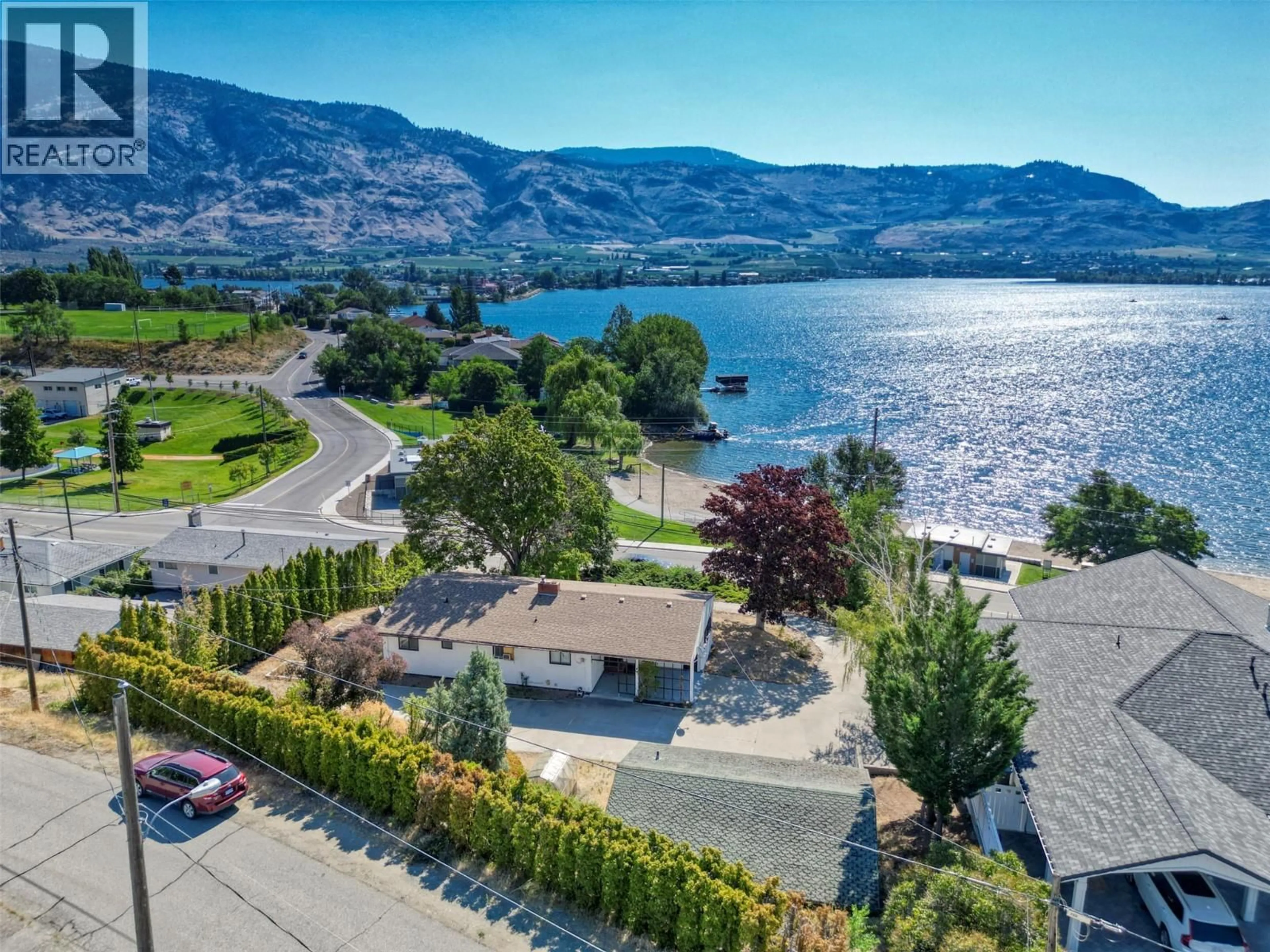 A pic from outside/outdoor area/front of a property/back of a property/a pic from drone, water/lake/river/ocean view for 6406 89TH STREET, Osoyoos British Columbia V0H1V1