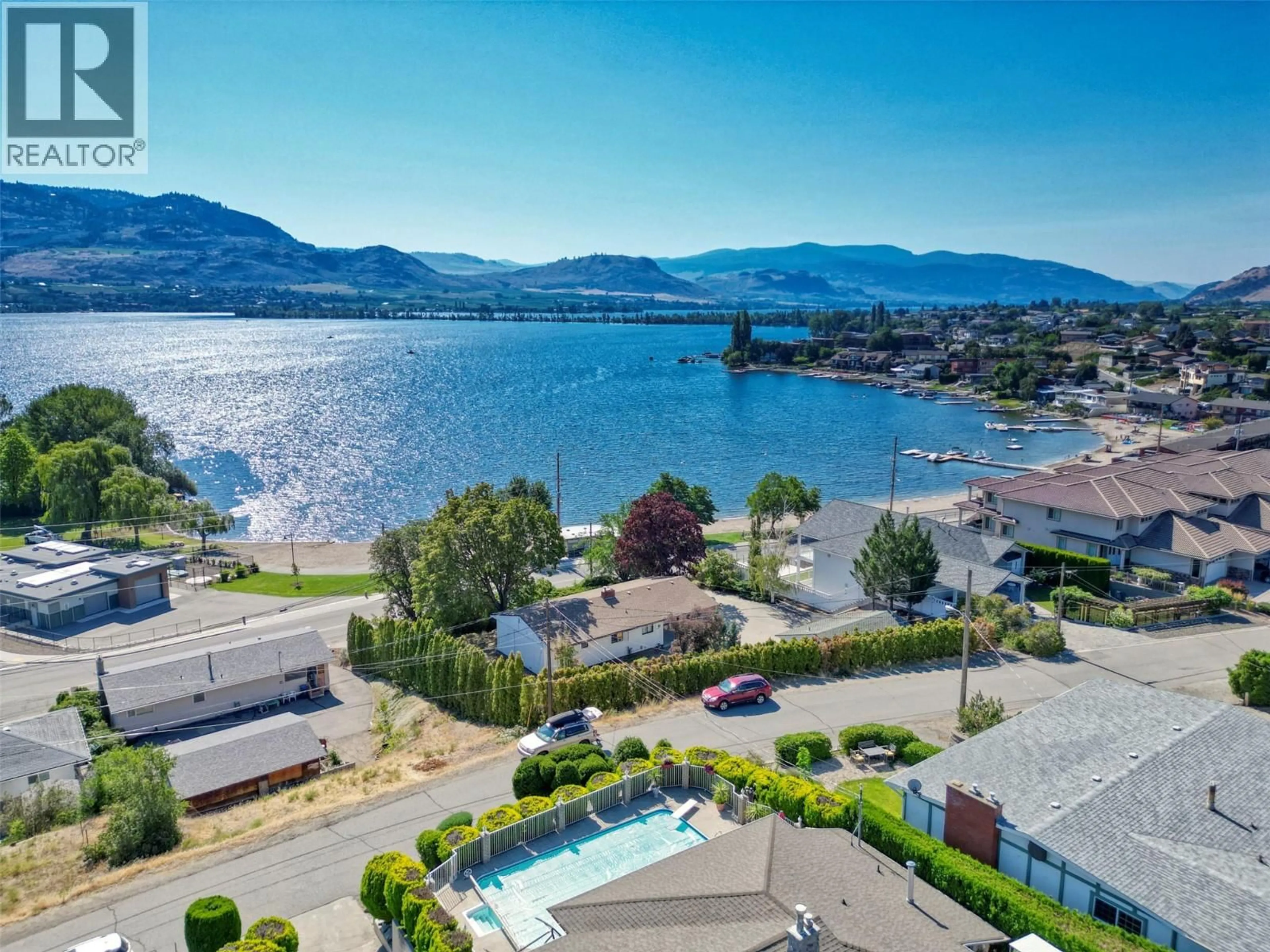 A pic from outside/outdoor area/front of a property/back of a property/a pic from drone, water/lake/river/ocean view for 6406 89TH STREET, Osoyoos British Columbia V0H1V1
