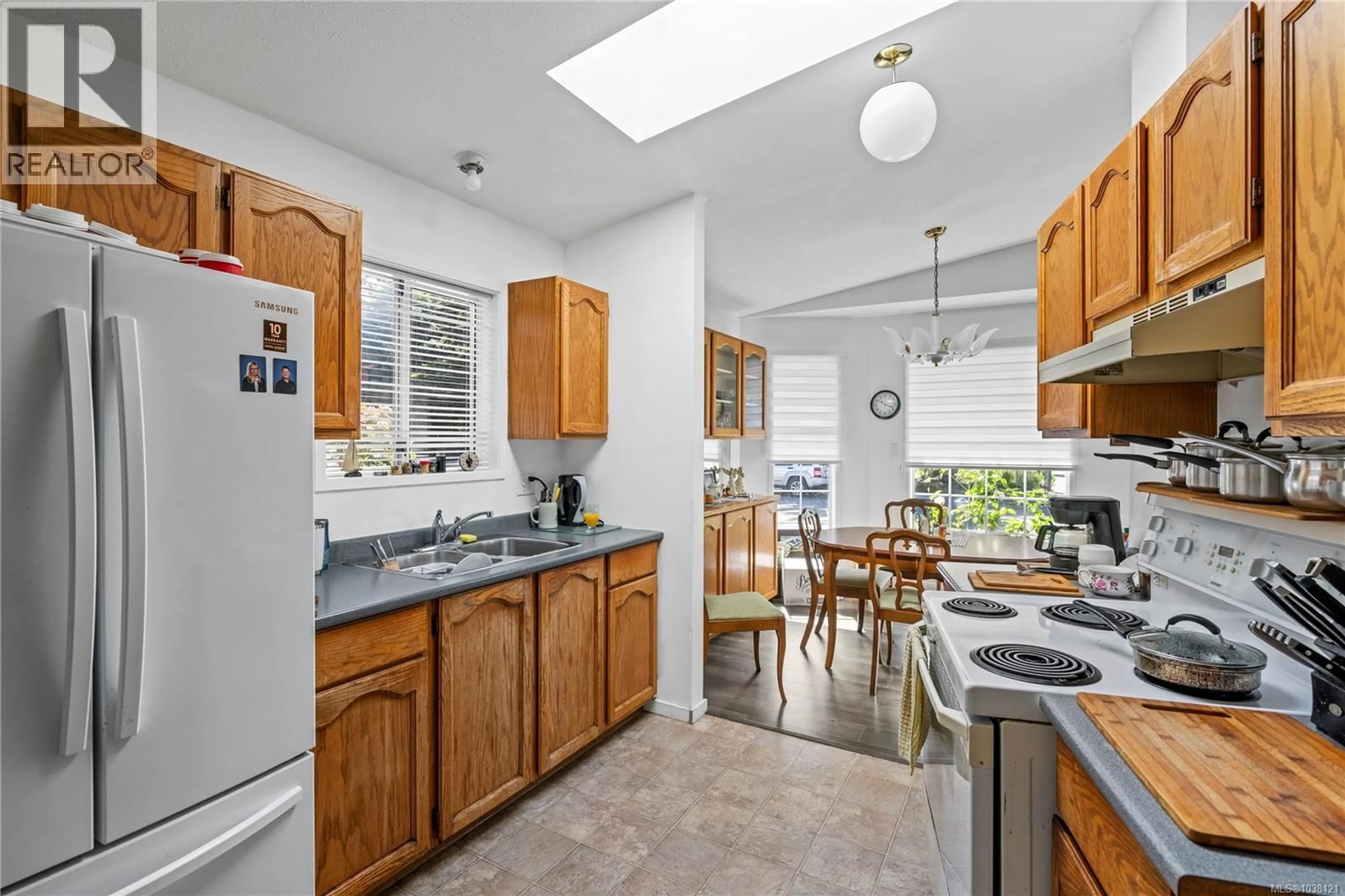 Standard kitchen, ceramic/tile floor for 2454 5TH STREET EAST, Courtenay British Columbia V9N8J2
