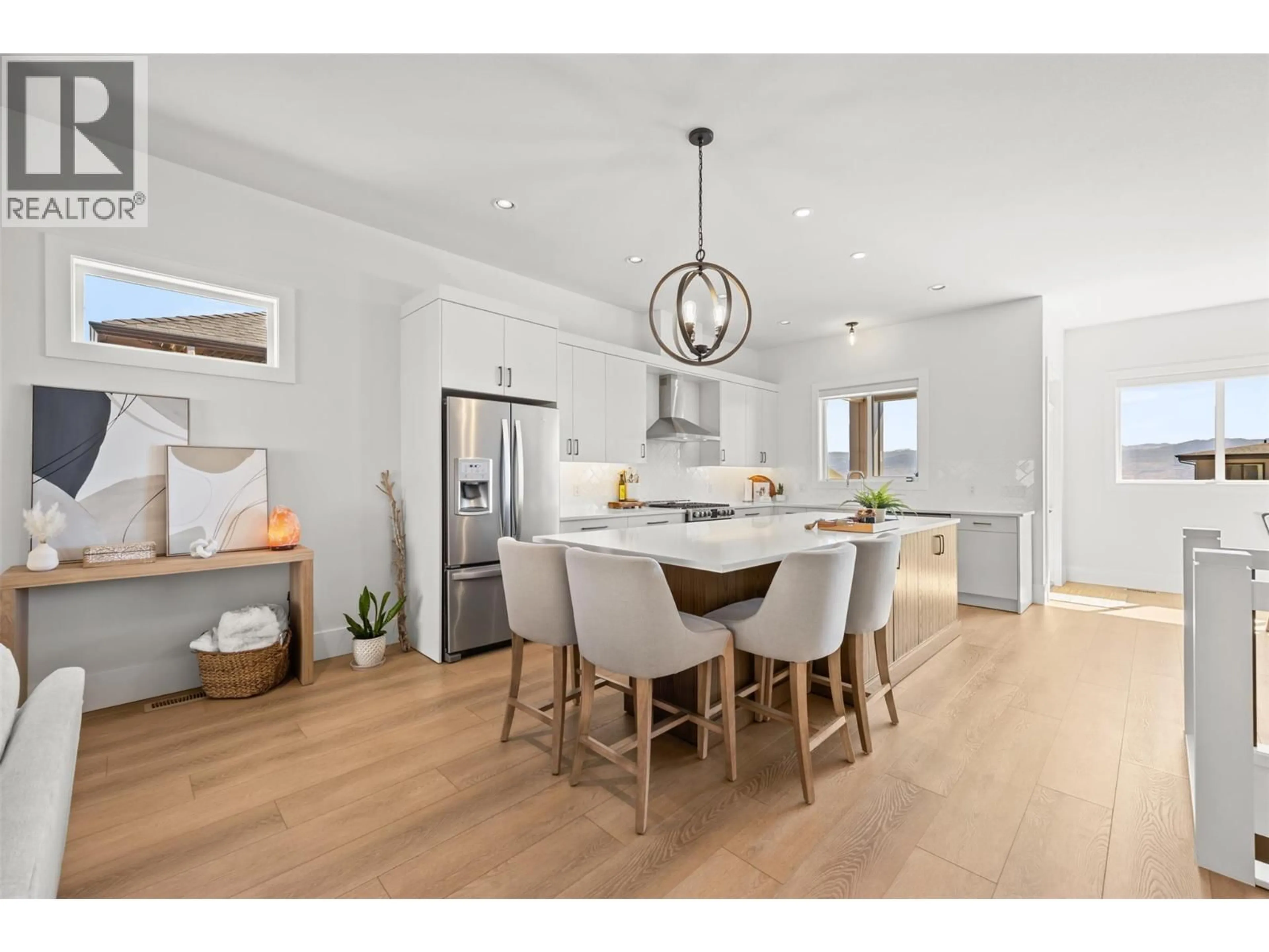 Open concept kitchen, wood/laminate floor for 2598 CROWN CREST DRIVE, West Kelowna British Columbia V4T3N3