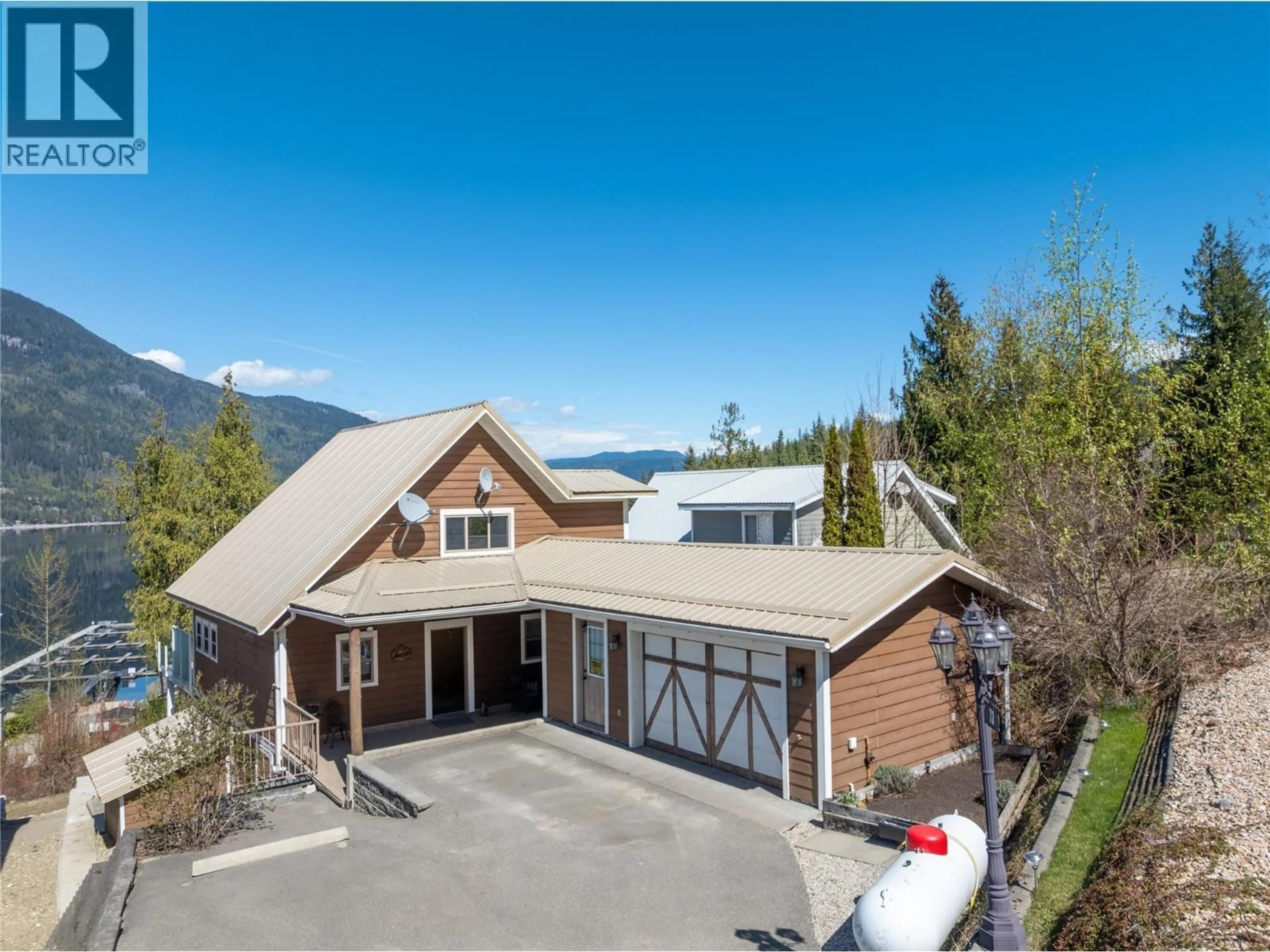 A pic from outside/outdoor area/front of a property/back of a property/a pic from drone, mountain view for 73 - 6421 EAGLE BAY ROAD, Eagle Bay British Columbia V0E1T0