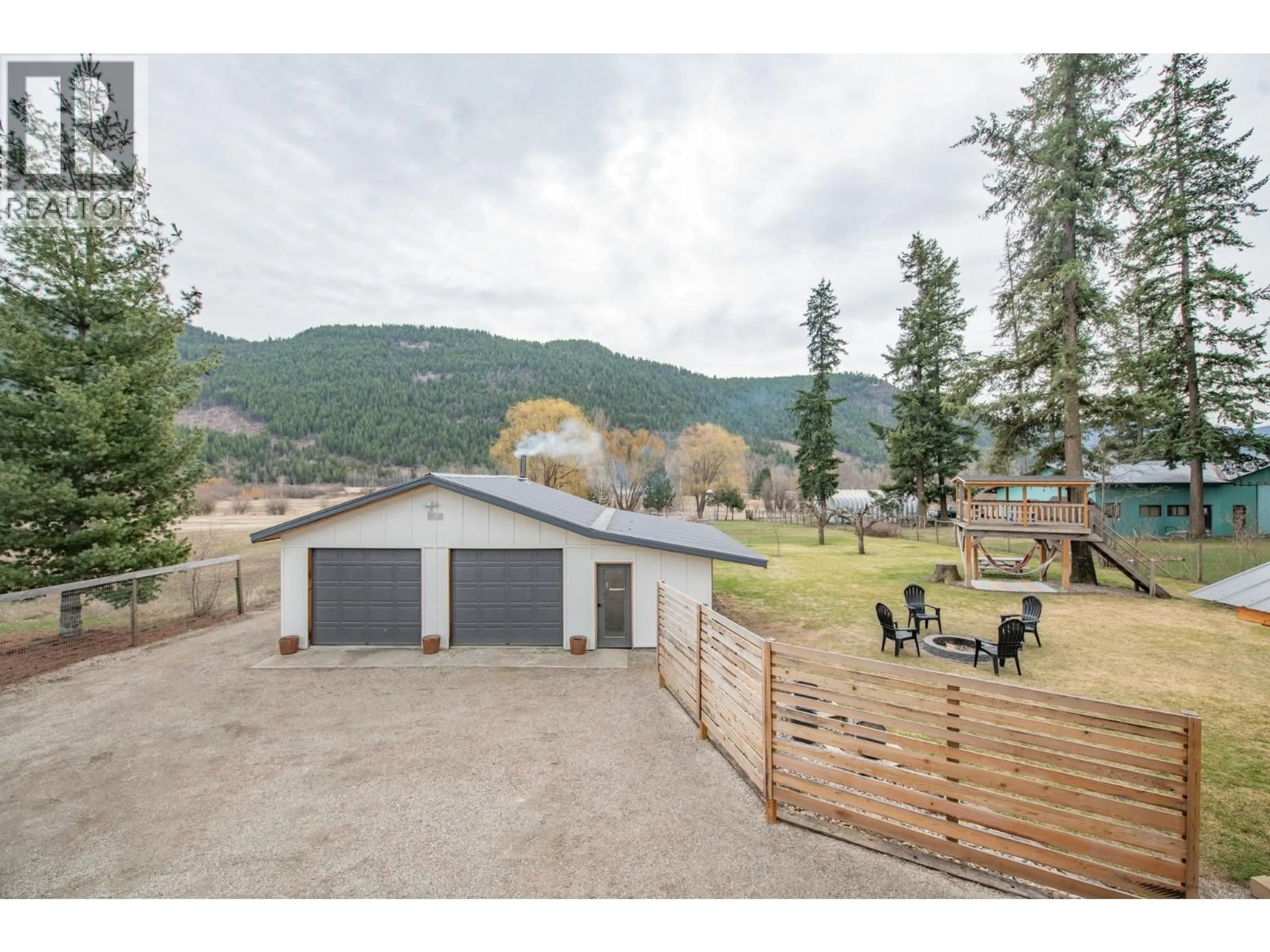 A pic from outside/outdoor area/front of a property/back of a property/a pic from drone, mountain view for 303 LUMBY MABEL LAKE ROAD, Lumby British Columbia V0E2G5