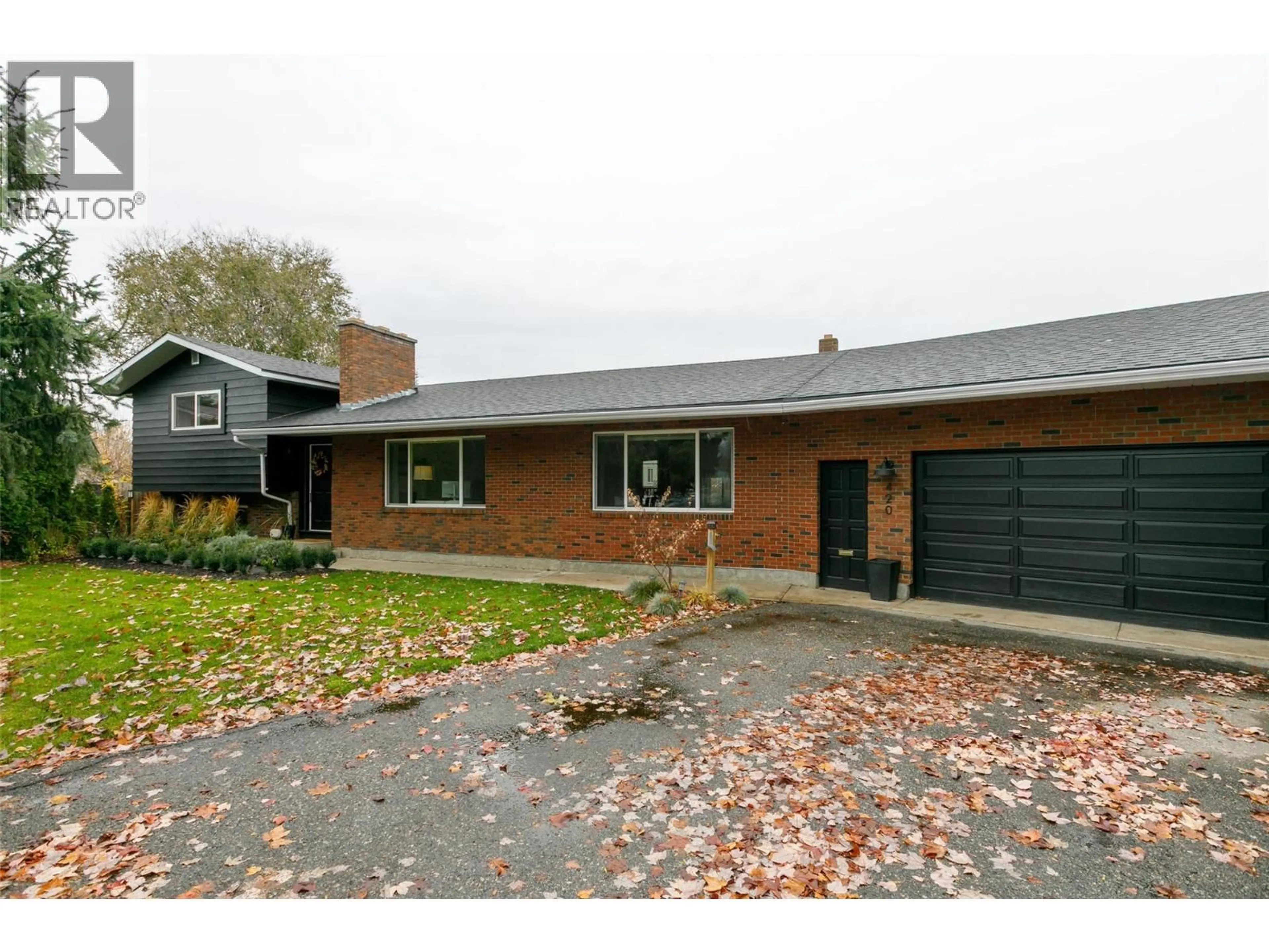 Home with brick exterior material, street for 420 MUGFORD COURT, Kelowna British Columbia V1X5N4