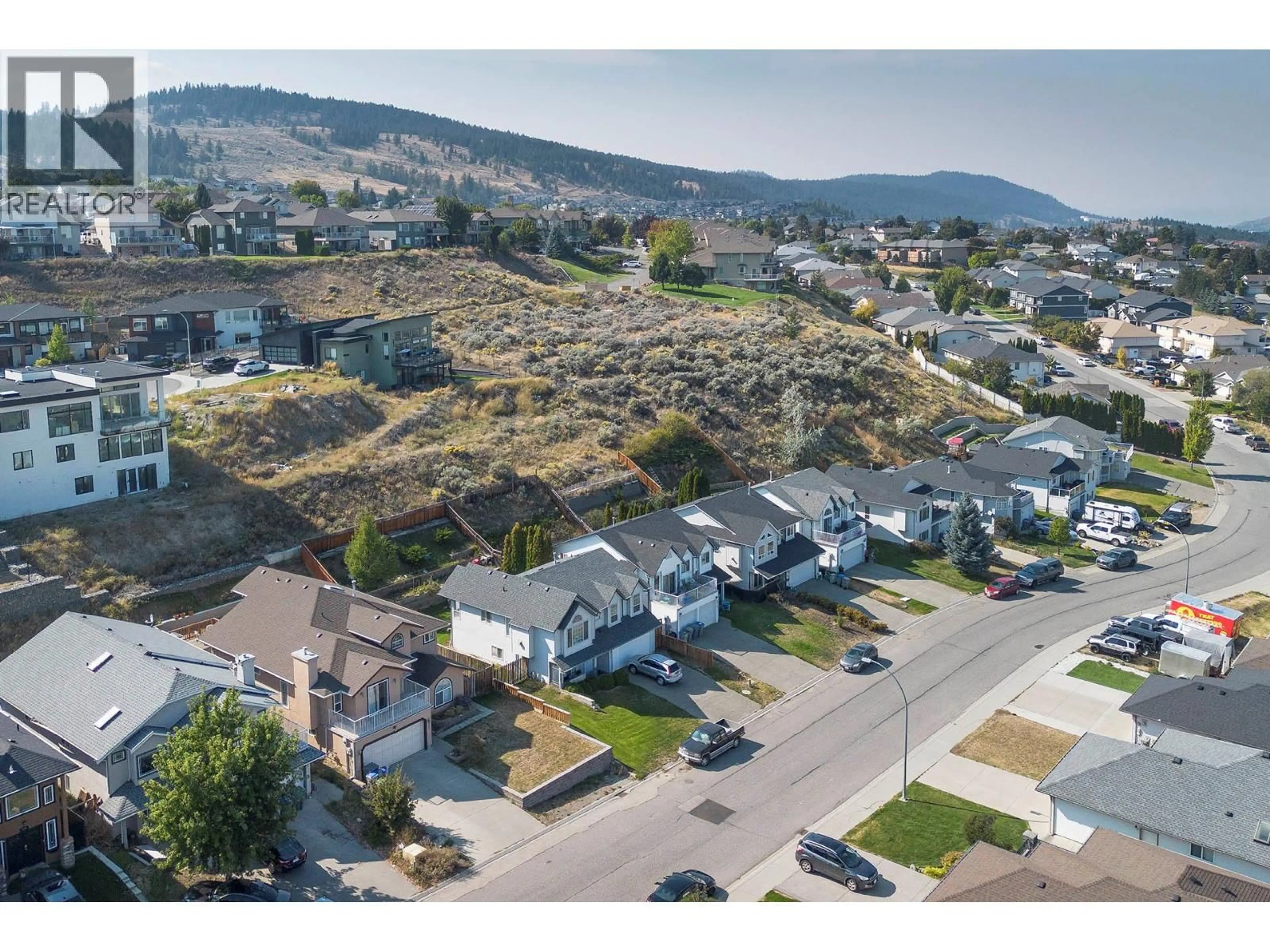 A pic from outside/outdoor area/front of a property/back of a property/a pic from drone, street for 667 DUNROBIN DRIVE, Kamloops British Columbia V1s1w2