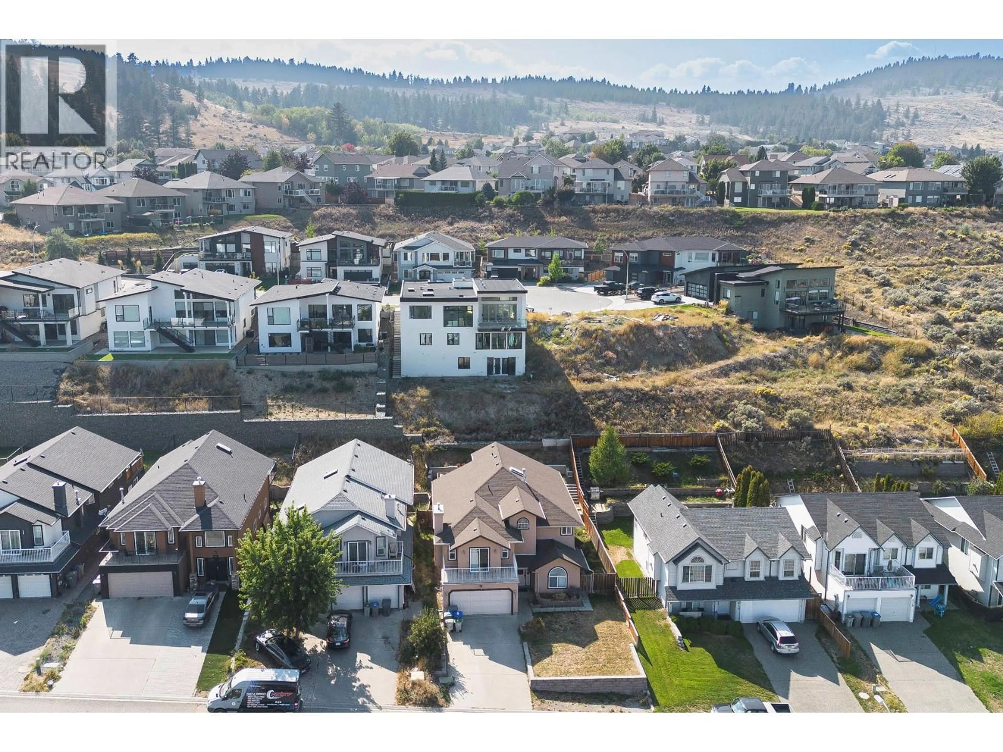 A pic from outside/outdoor area/front of a property/back of a property/a pic from drone, mountain view for 667 DUNROBIN DRIVE, Kamloops British Columbia V1s1w2